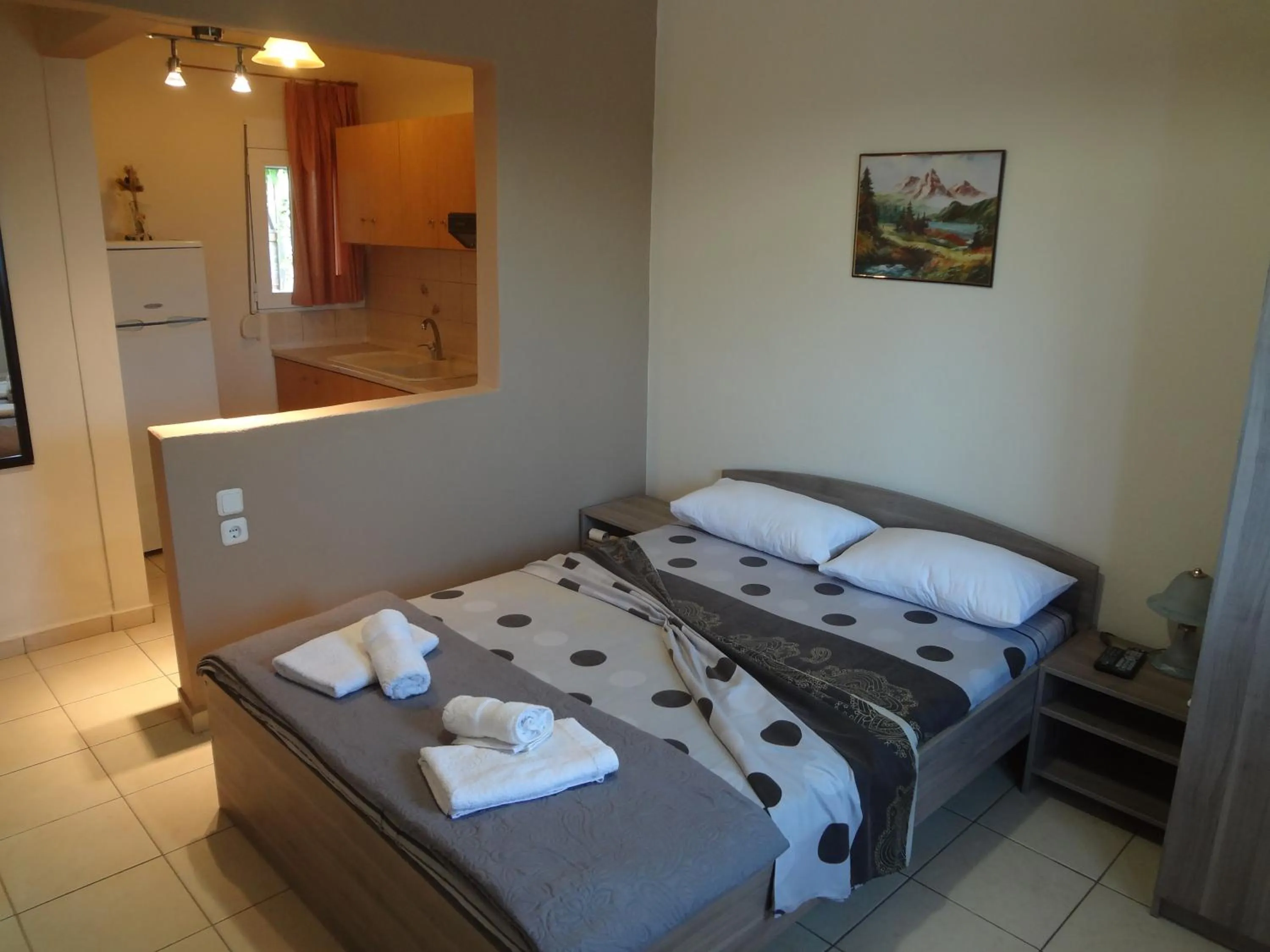 Bed in Nostos Apartments