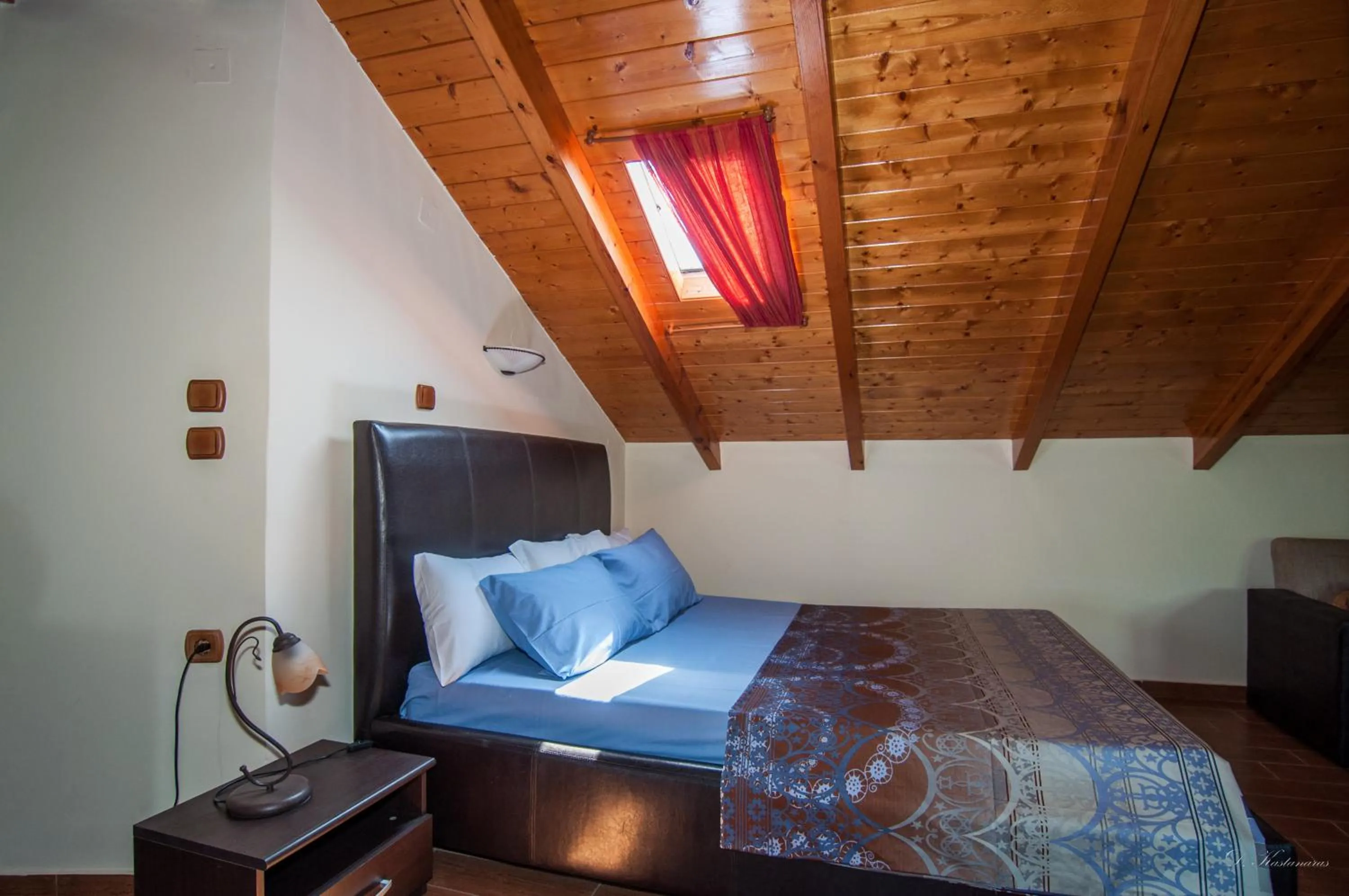 Bed in Nostos Apartments