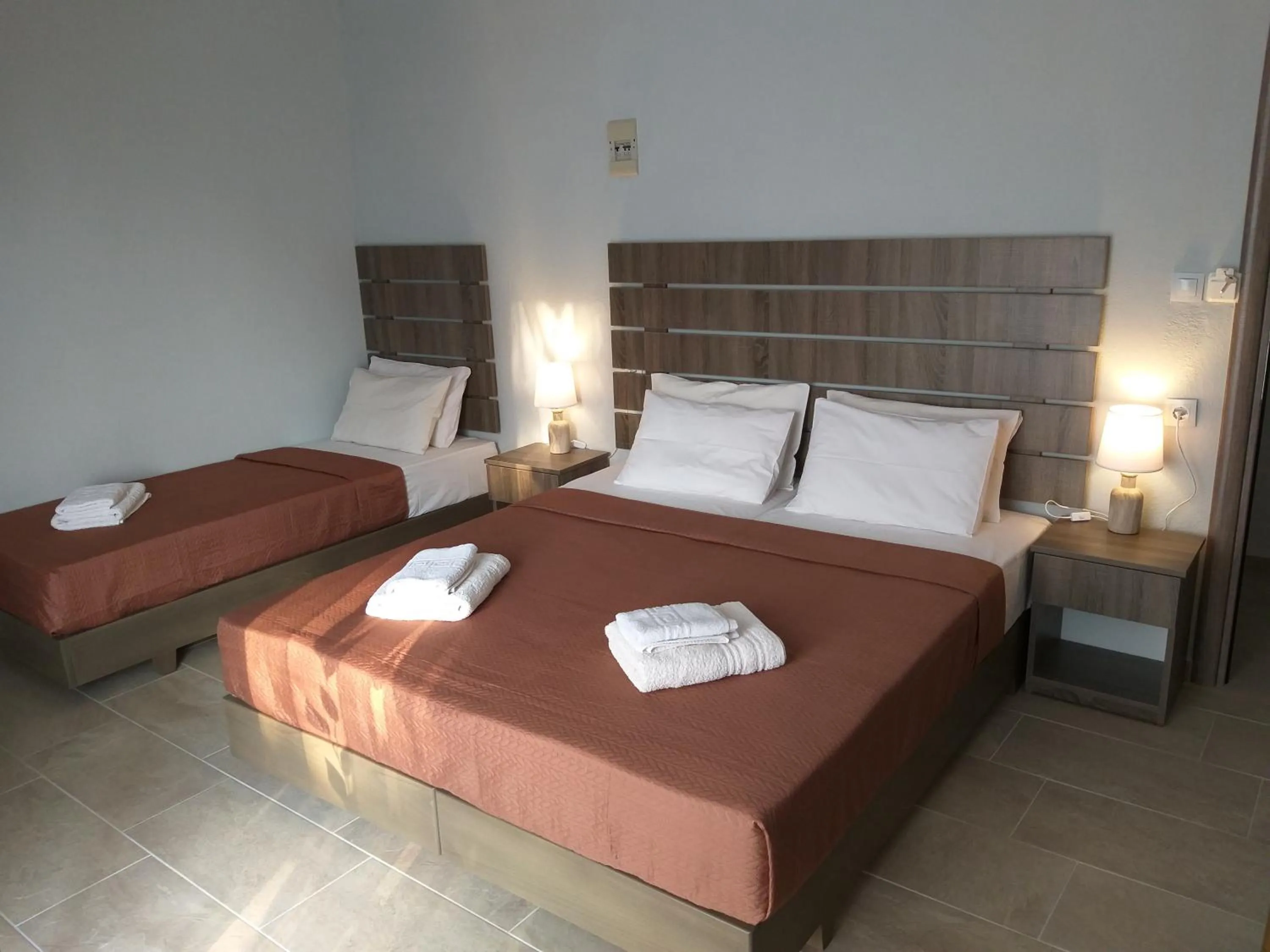 Bed in Nostos Apartments