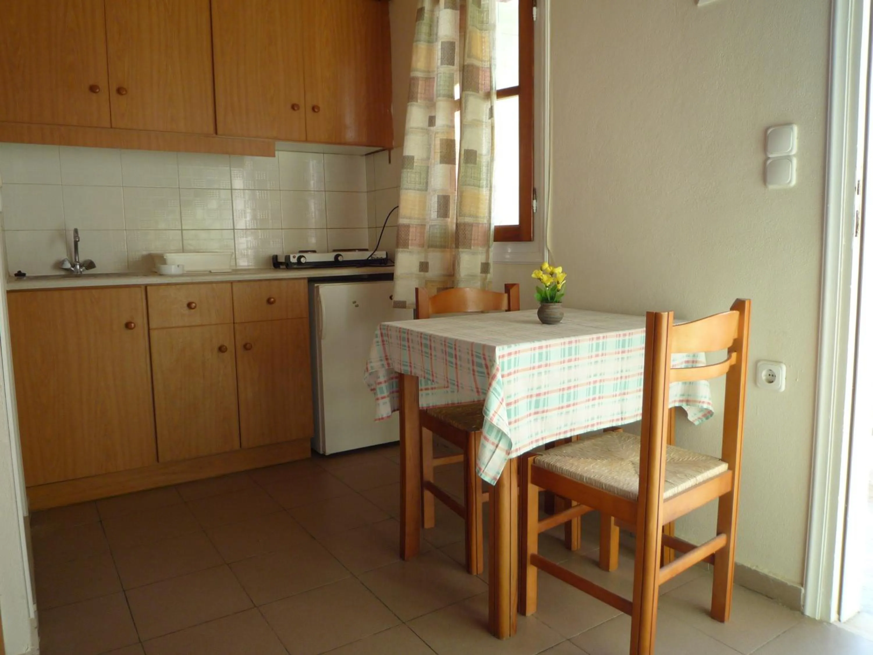 Kitchen or kitchenette in Haris Apartments