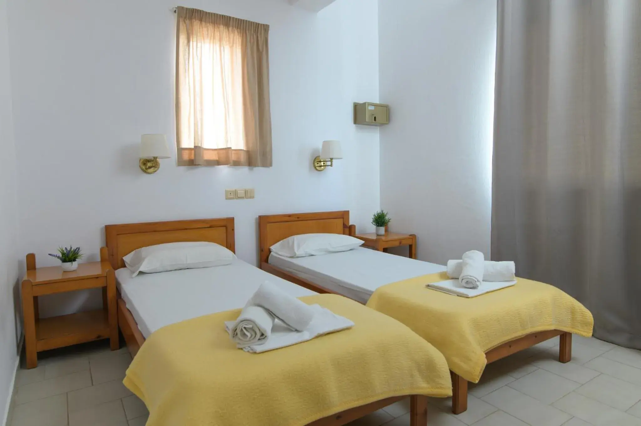 First Floor Triple Room with Garden View in Haris Apartments First Floor Triple Room with Garden View in Haris Apartments