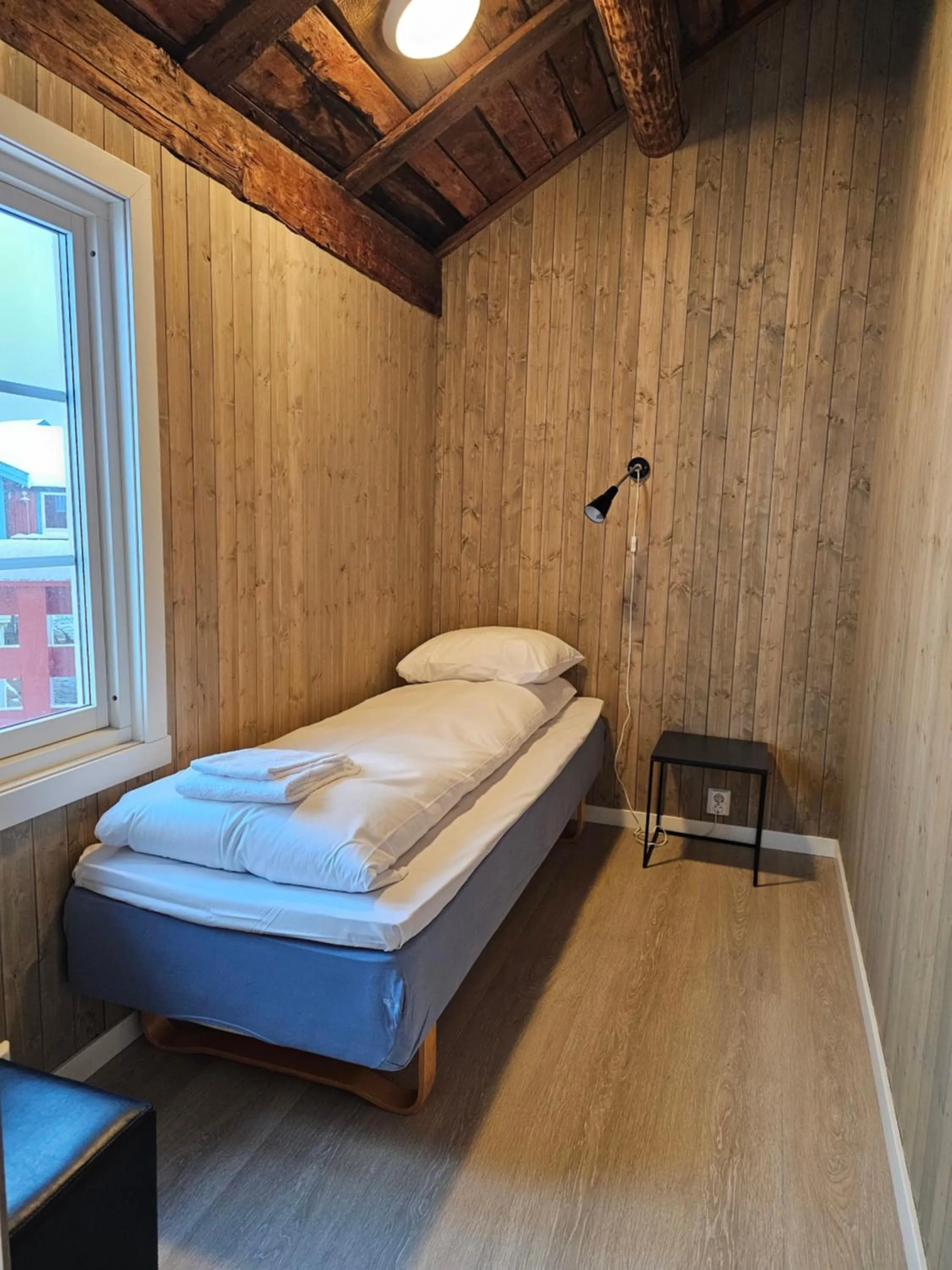 Bed in Å Rorbuer - by Classic Norway Hotels