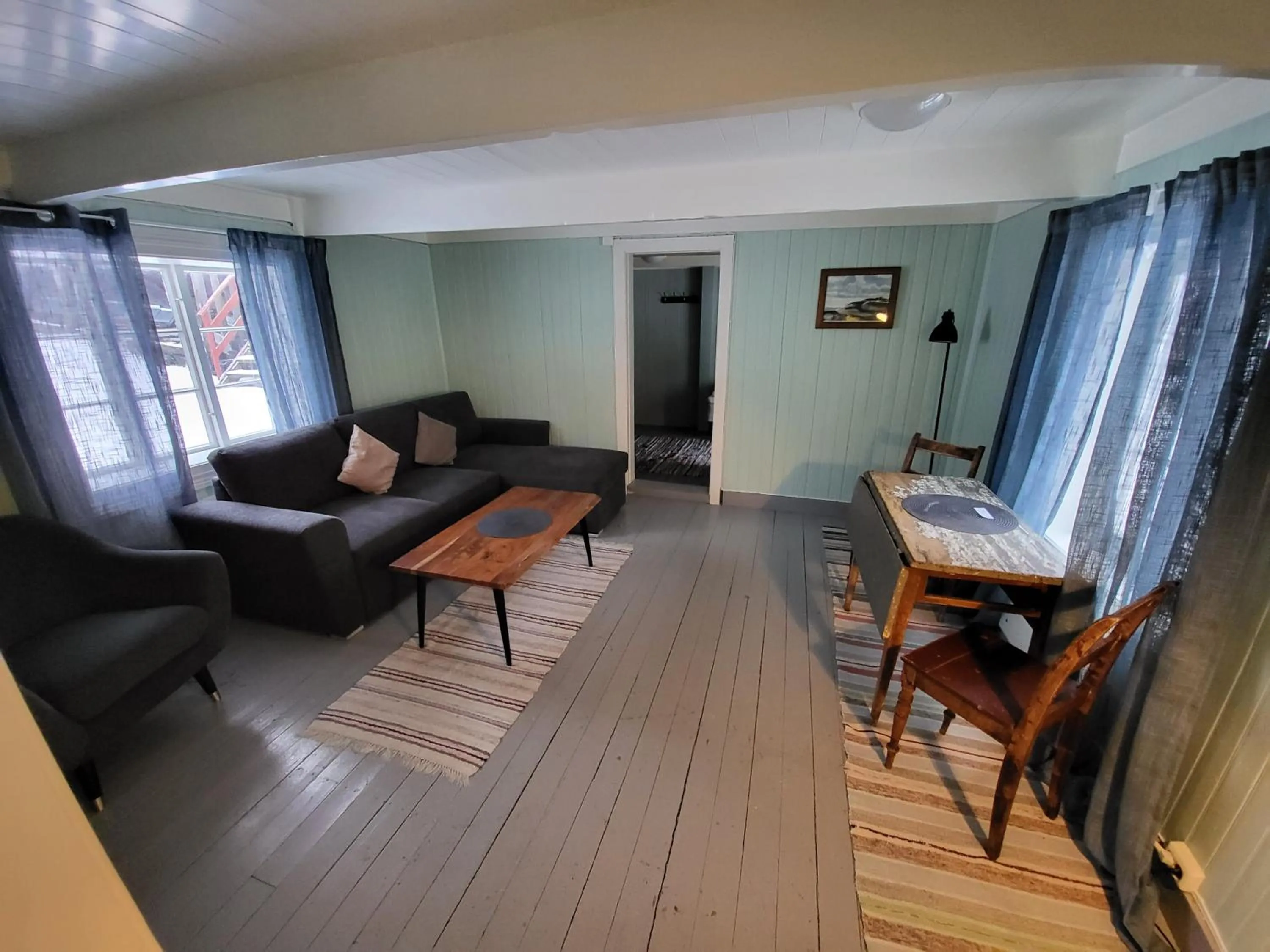 Living room in Å Rorbuer - by Classic Norway Hotels