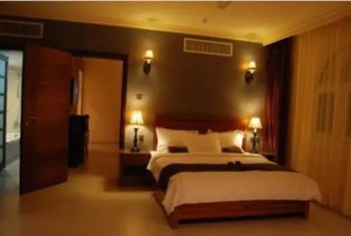 Bed in La Rosa Hotel Oman