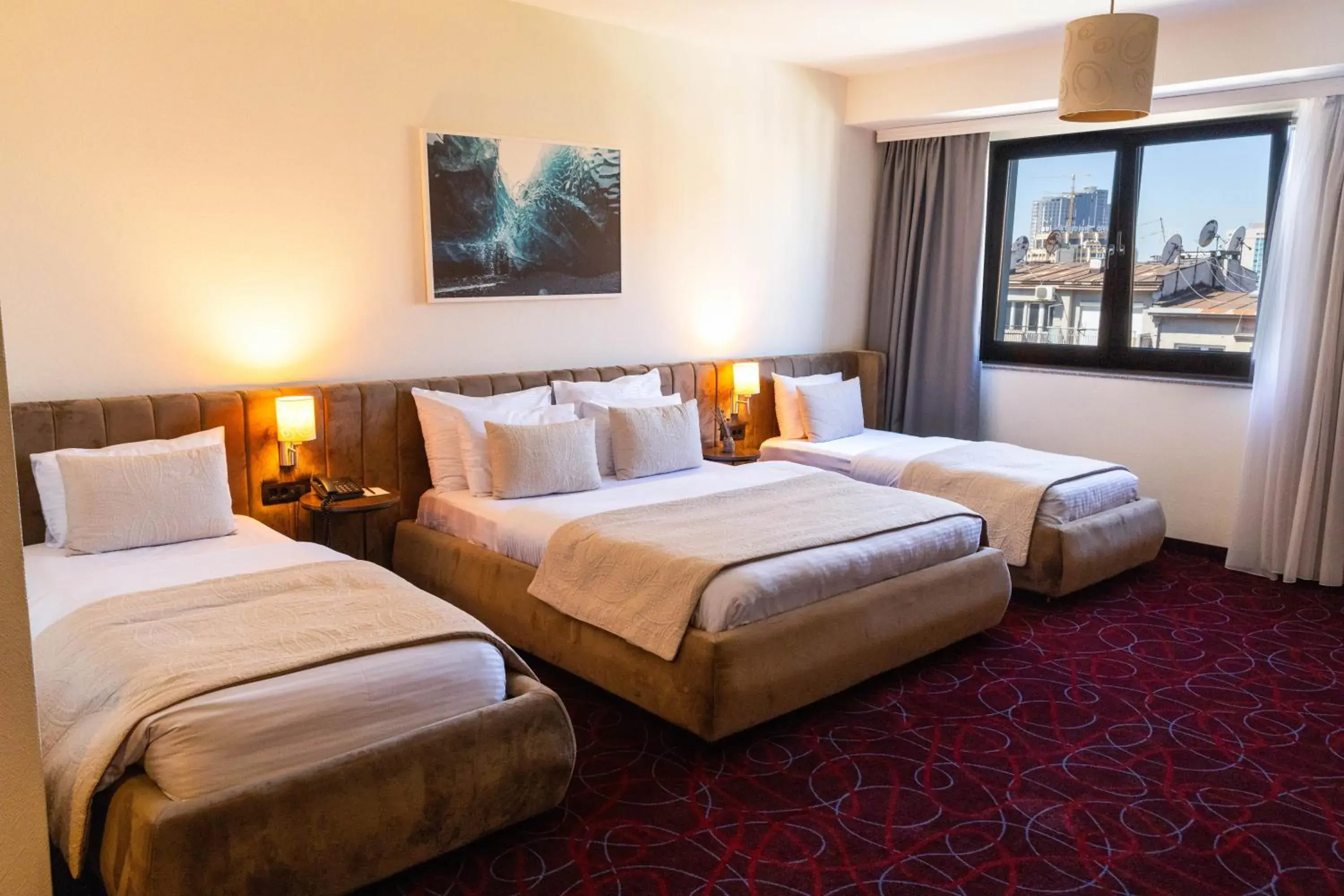 Triple Room in Hotel Sirius Triple Room in Hotel Sirius