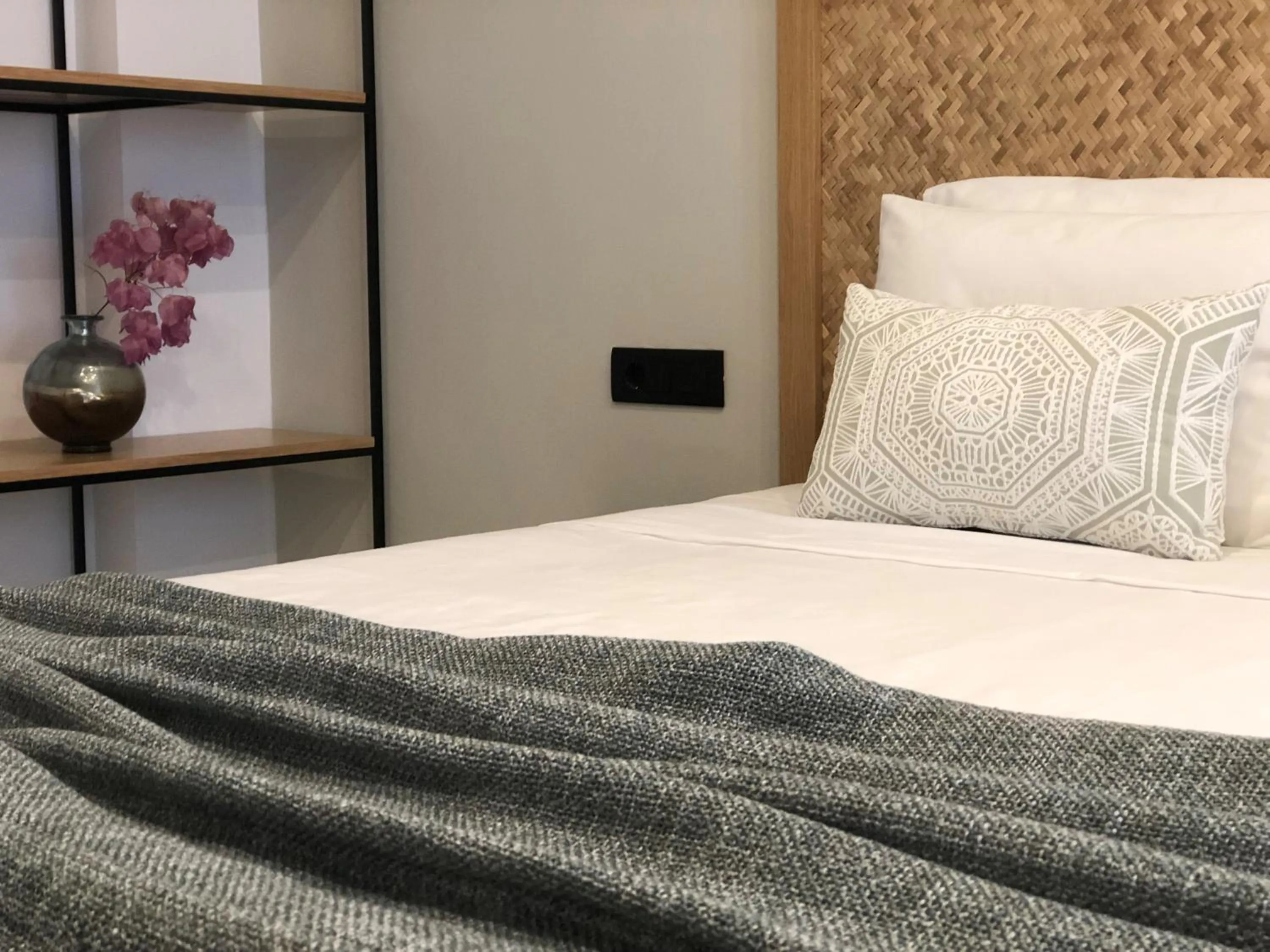 Bed in Nirvana Beach Hotel