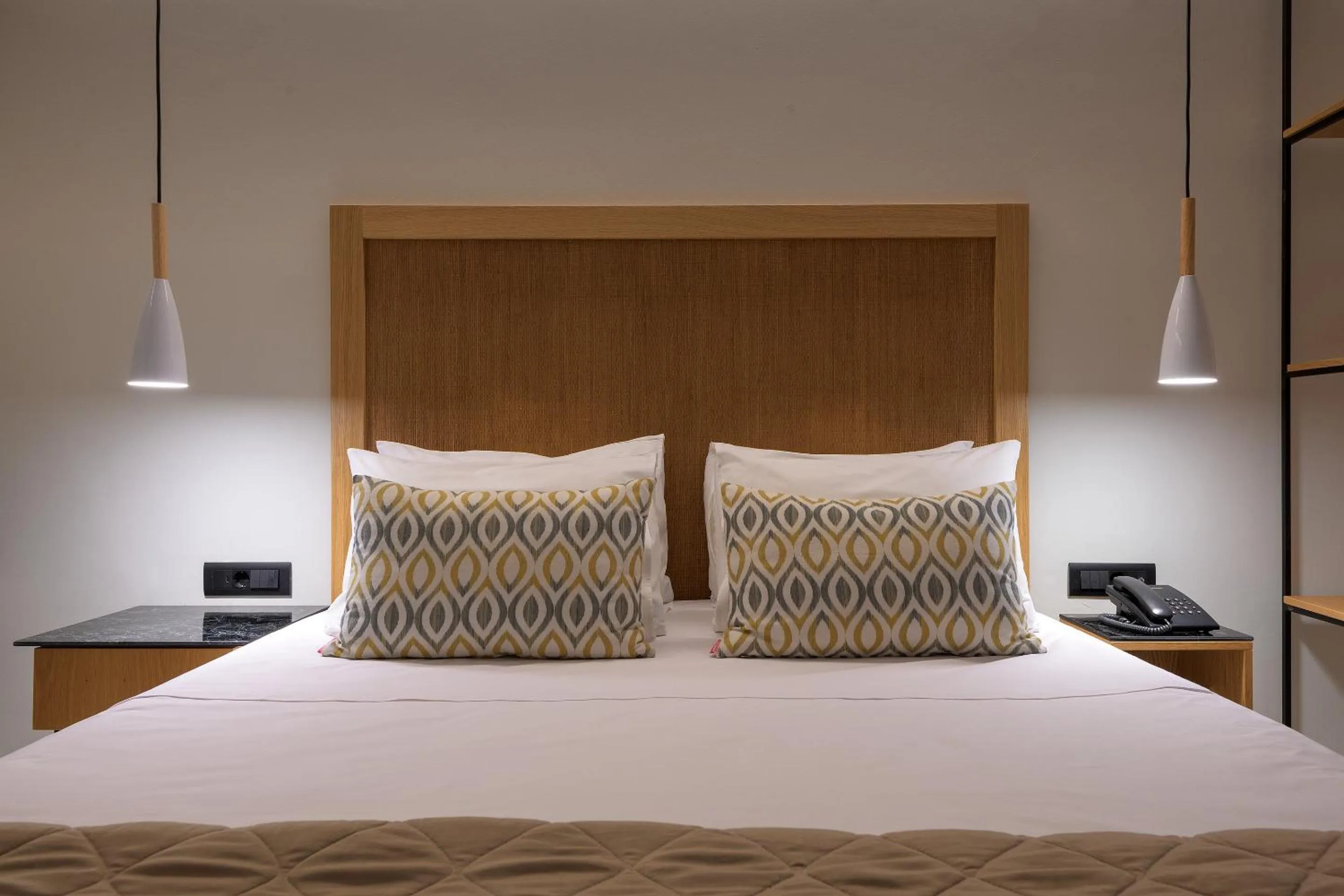 Bed in Nirvana Beach Hotel