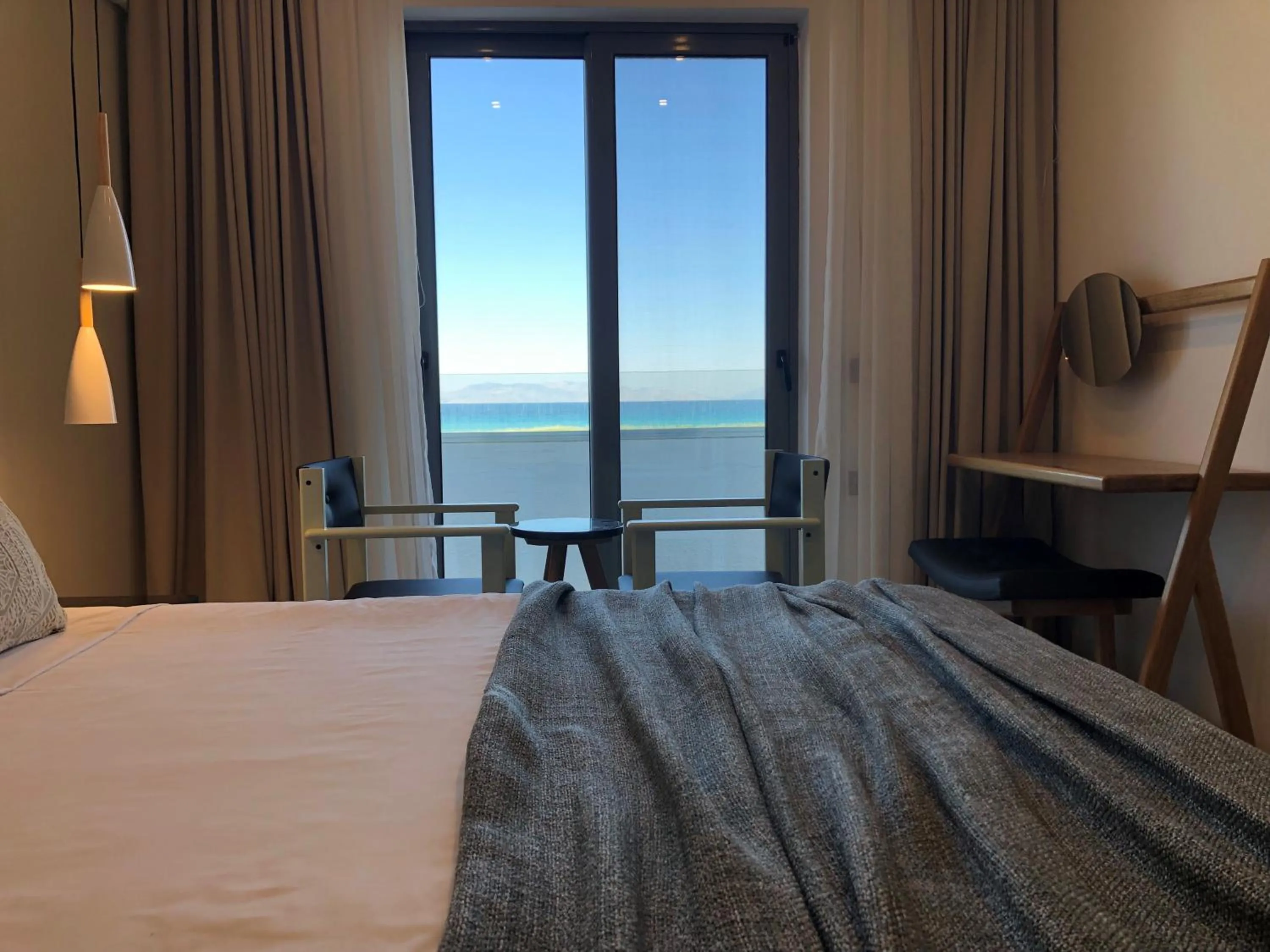 Bed in Nirvana Beach Hotel