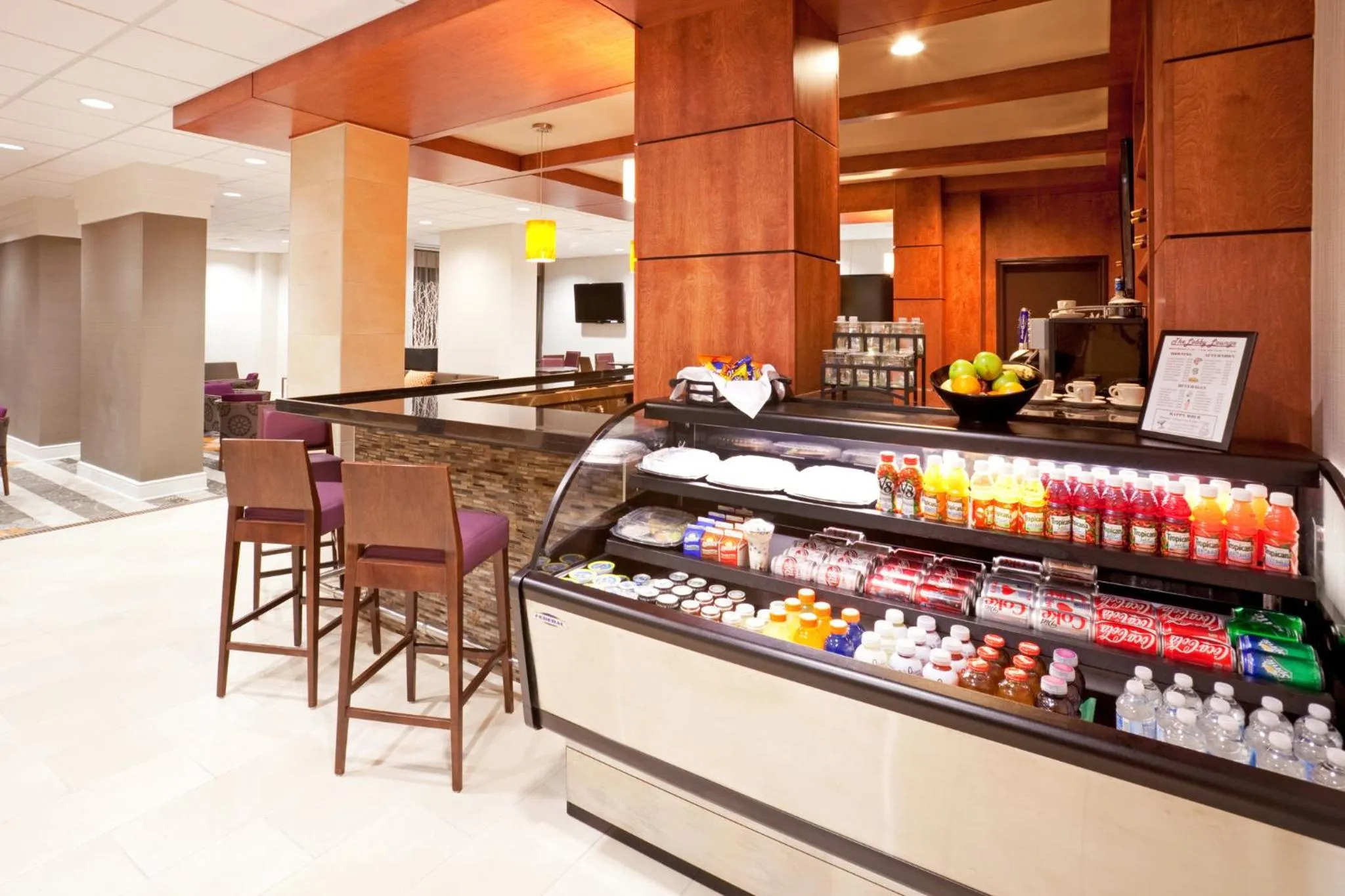 Lounge or bar in Holiday Inn Austin Midtown by IHG