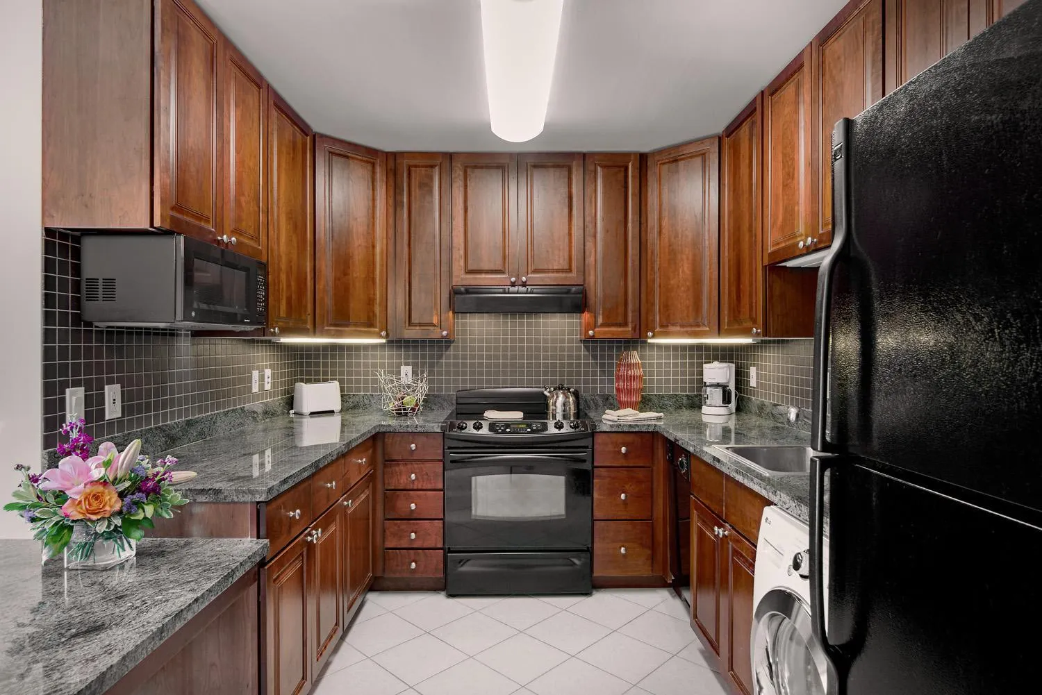 Kitchen or kitchenette in Broadway Plaza, Trademark Collection by Wyndham