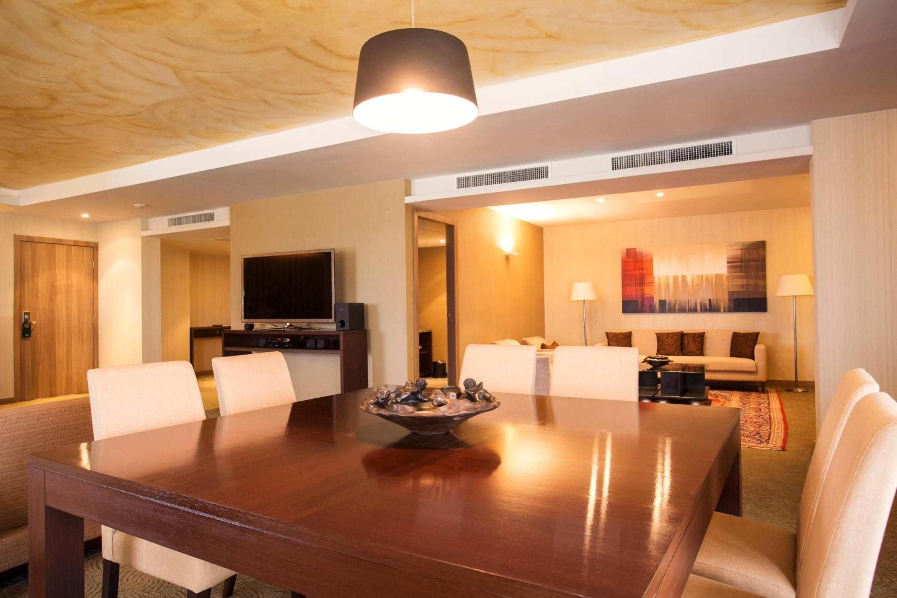 Communal lounge/ TV room in Gran Bourbon Hotel Asuncion