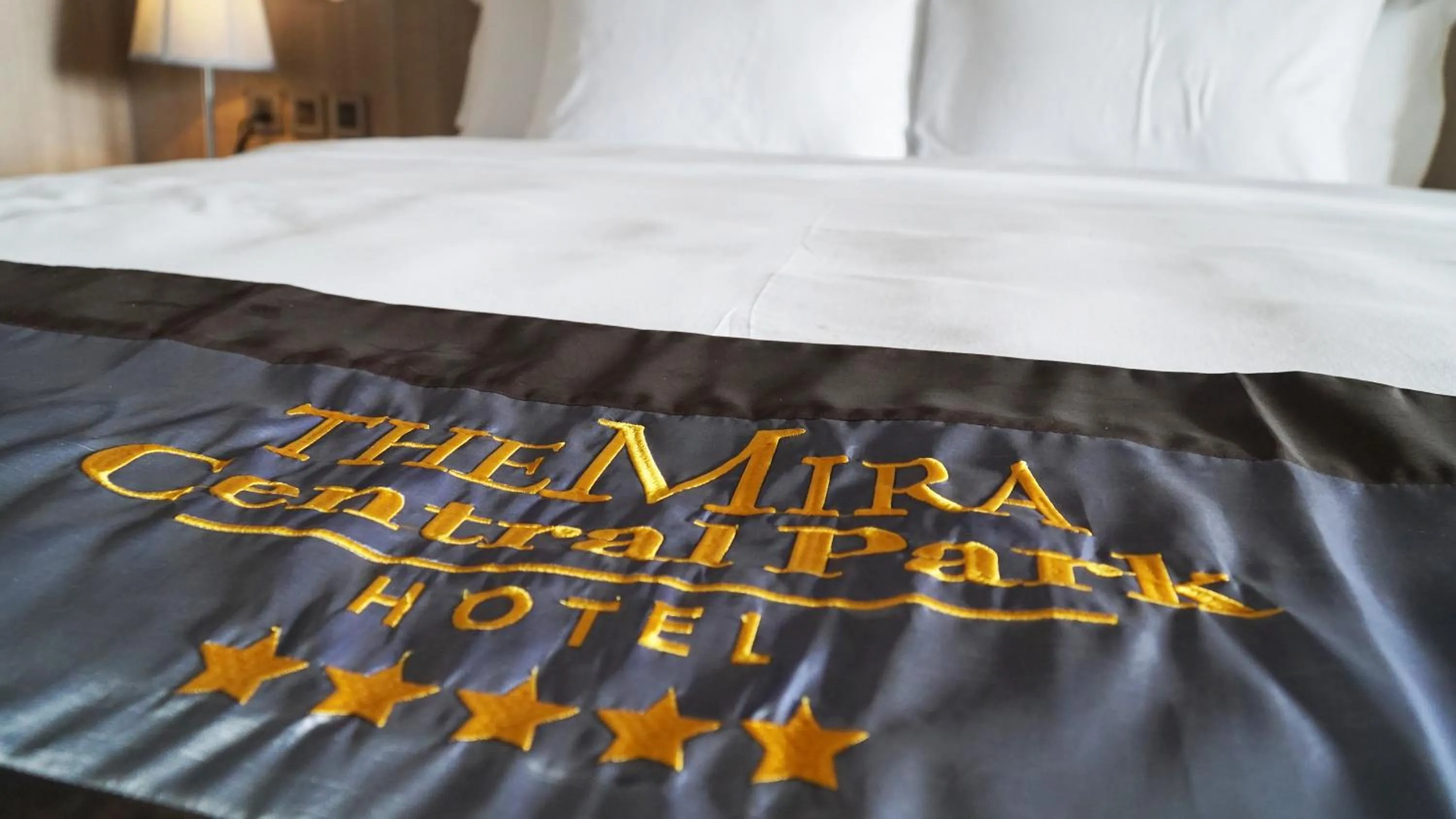 Bed in The Mira Central Park Hotel