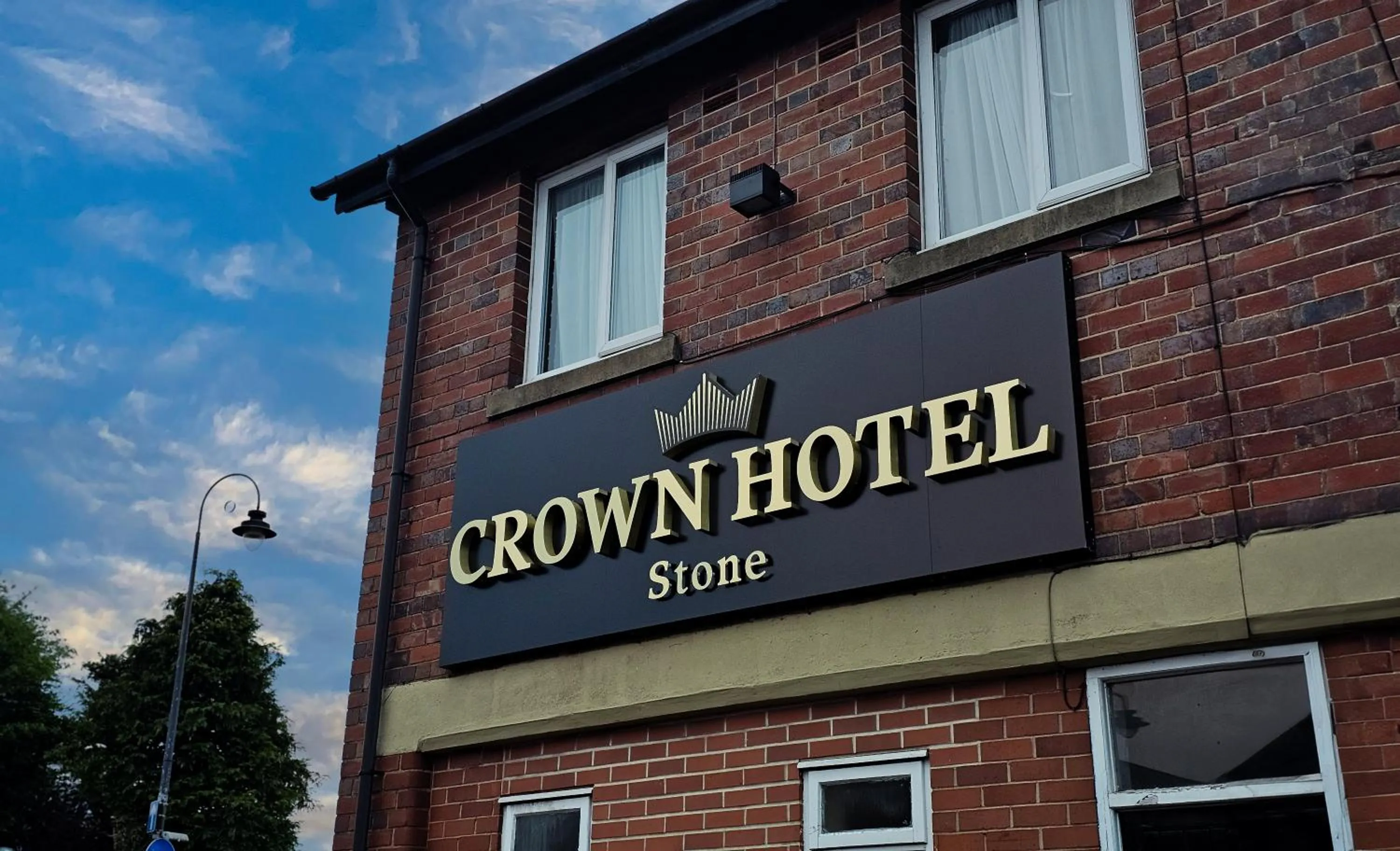 Property logo or sign in Crown Hotel Stone