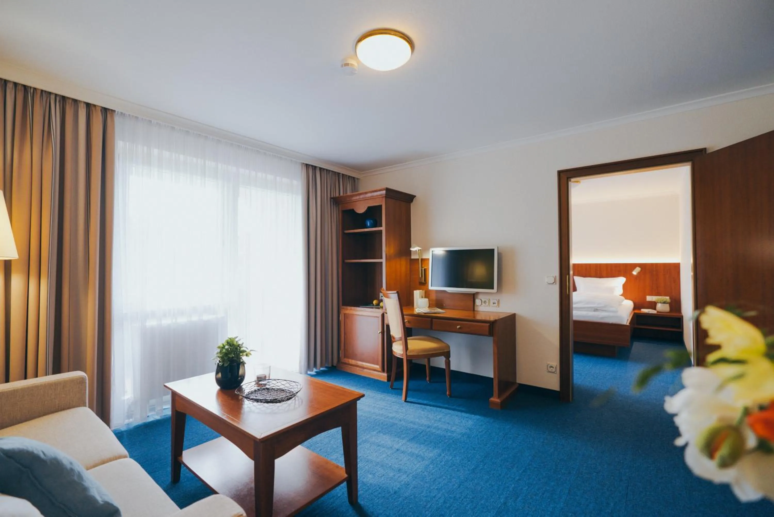 Bed in Hotel Reindl Suiten & Appartments