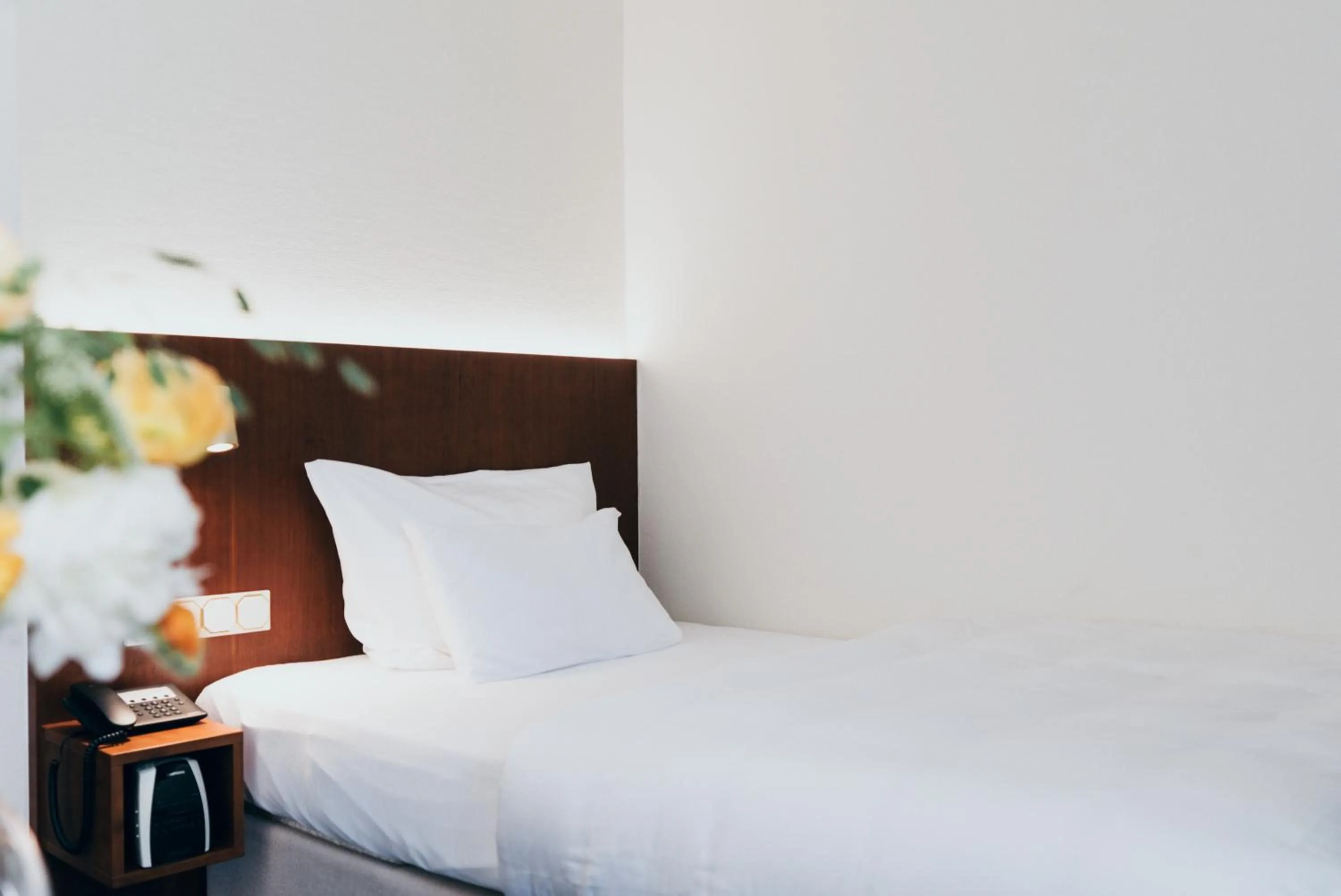Bed in Hotel Reindl Suiten & Appartments