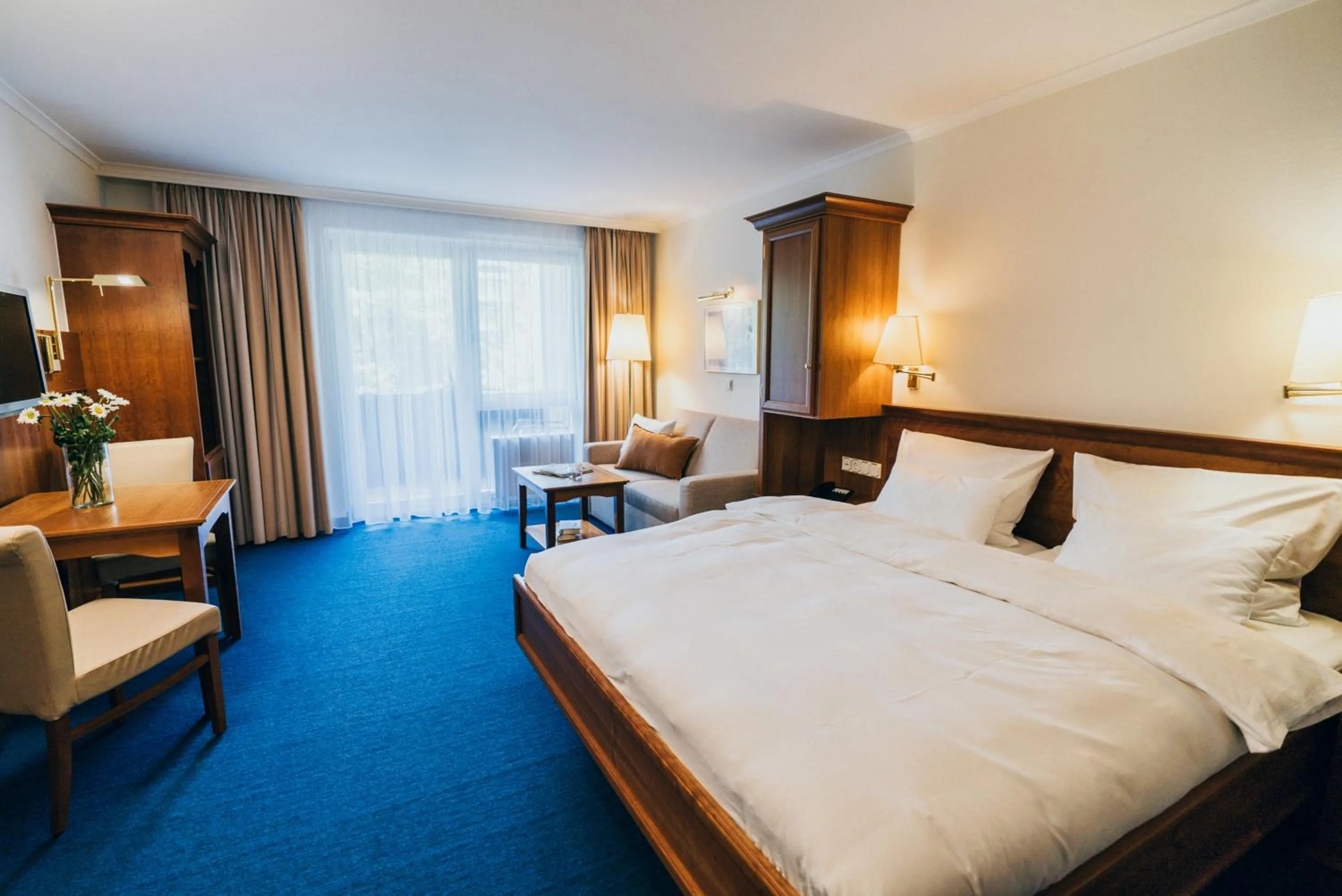 Bed in Hotel Reindl Suiten & Appartments