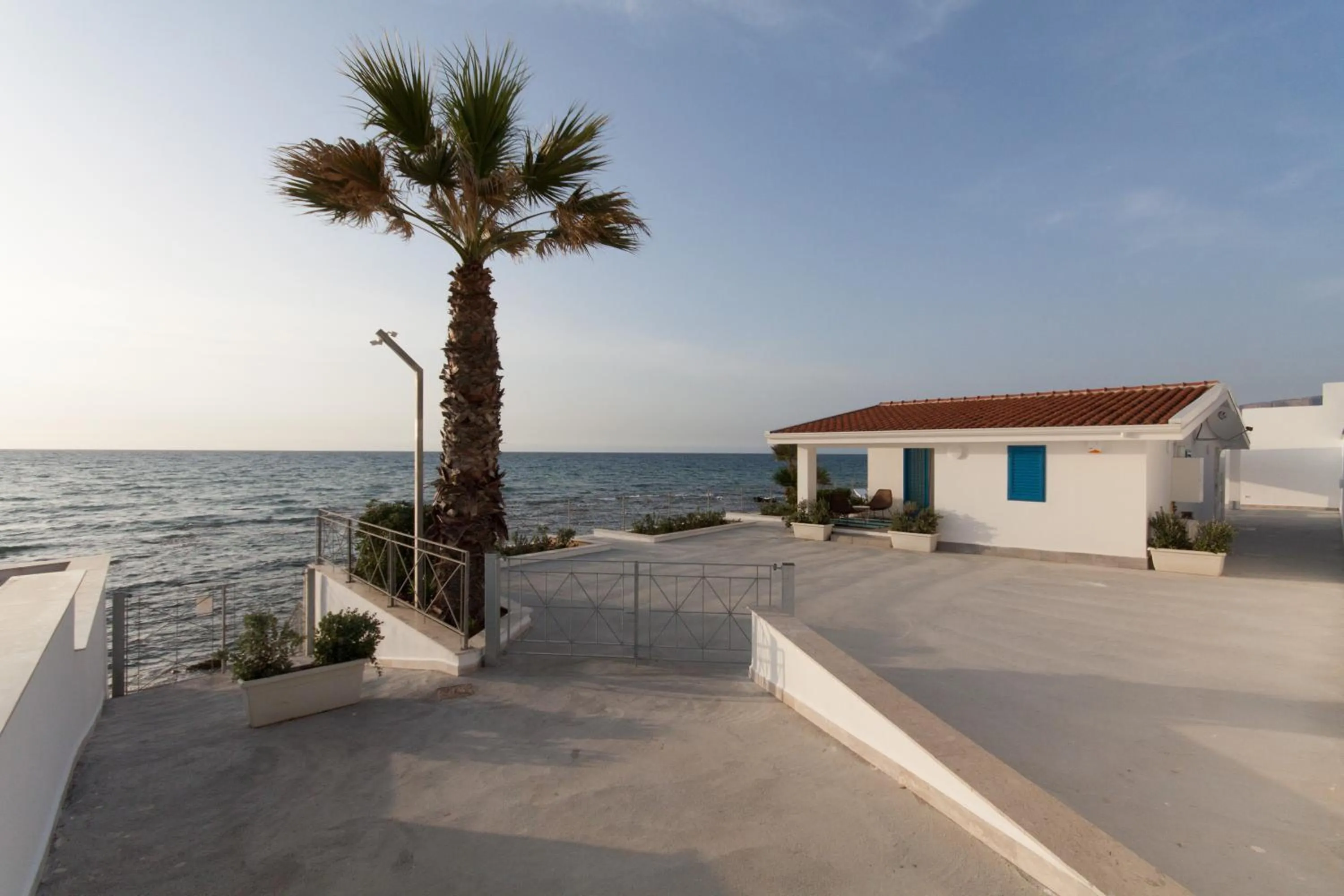 Kitchen or kitchenette in Marina Beach Resort by Le Dhome Sicily