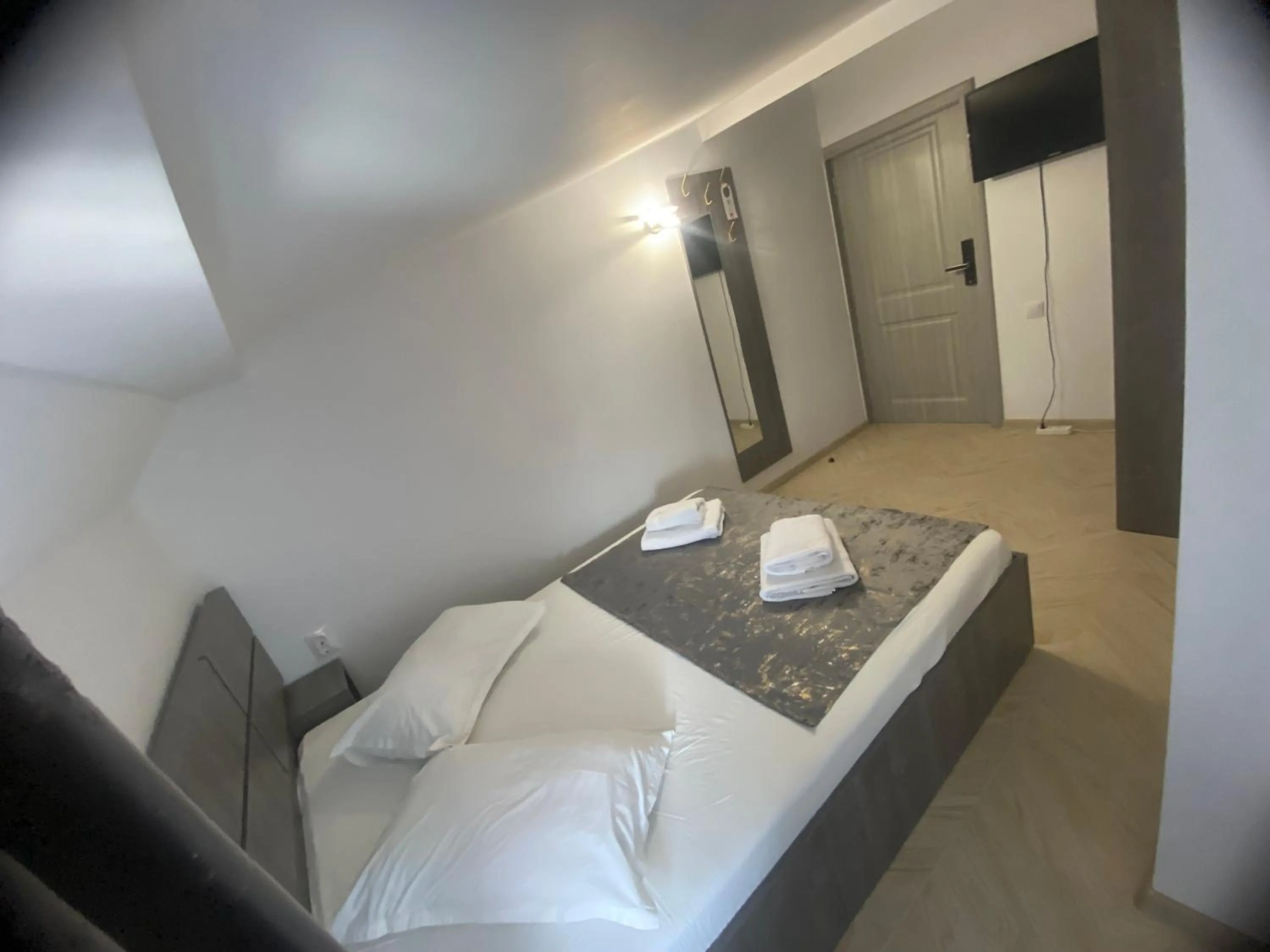 Bed in Flamingo Hotel