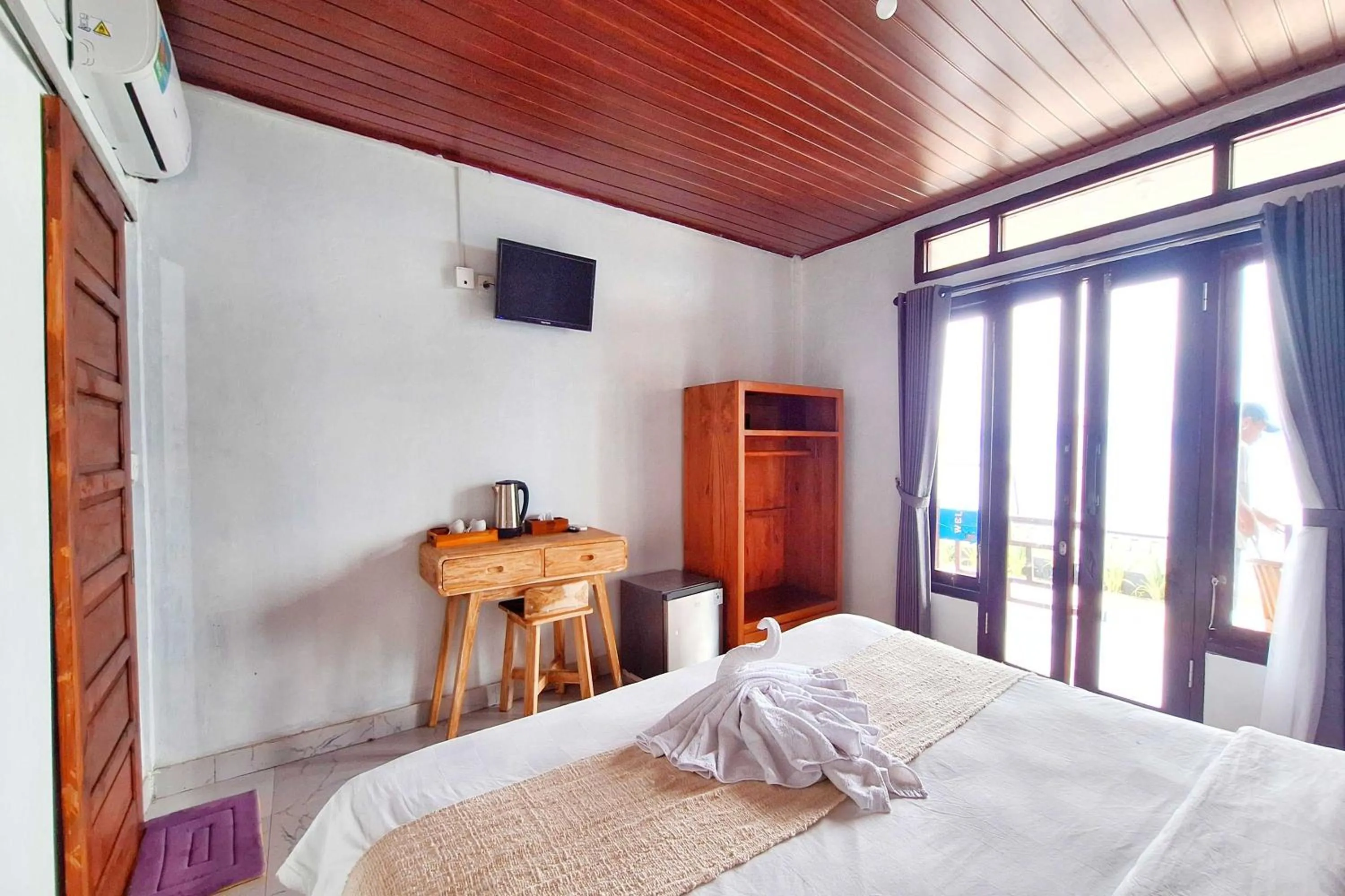 Bed in Road Beach Villa