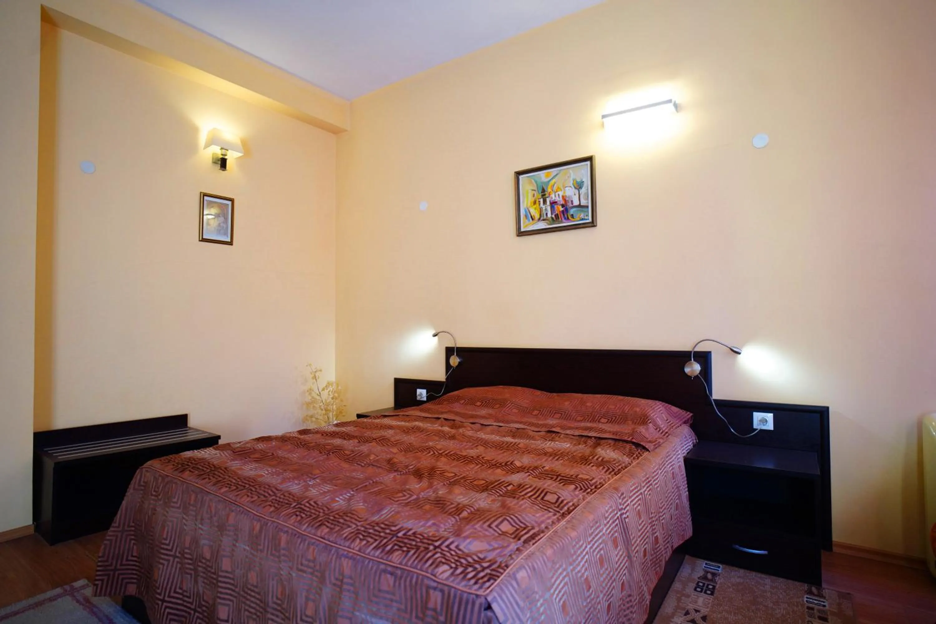 Bed in Family Art-Hotel Zora