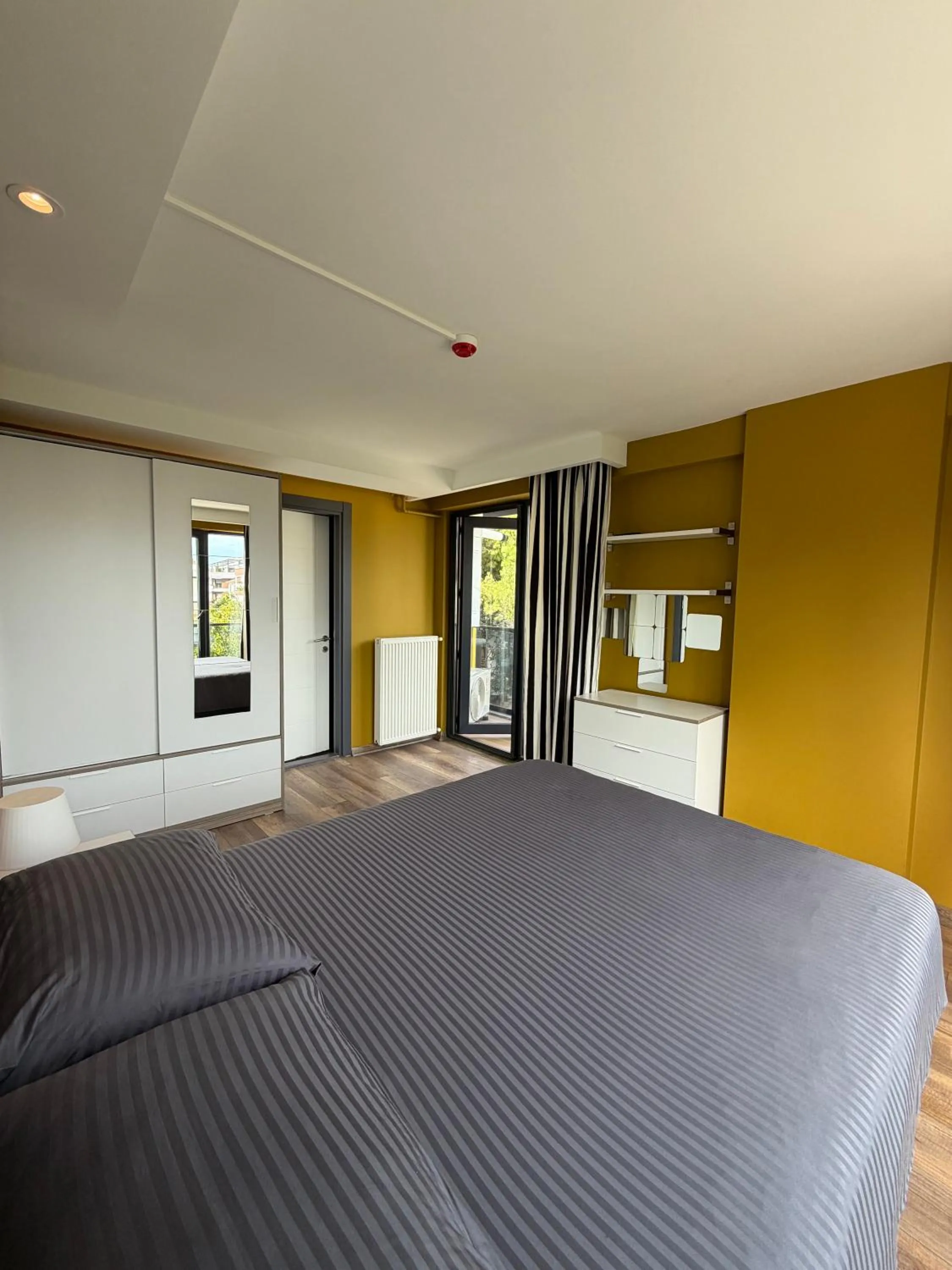 Bed in Deluxe Beach Residence