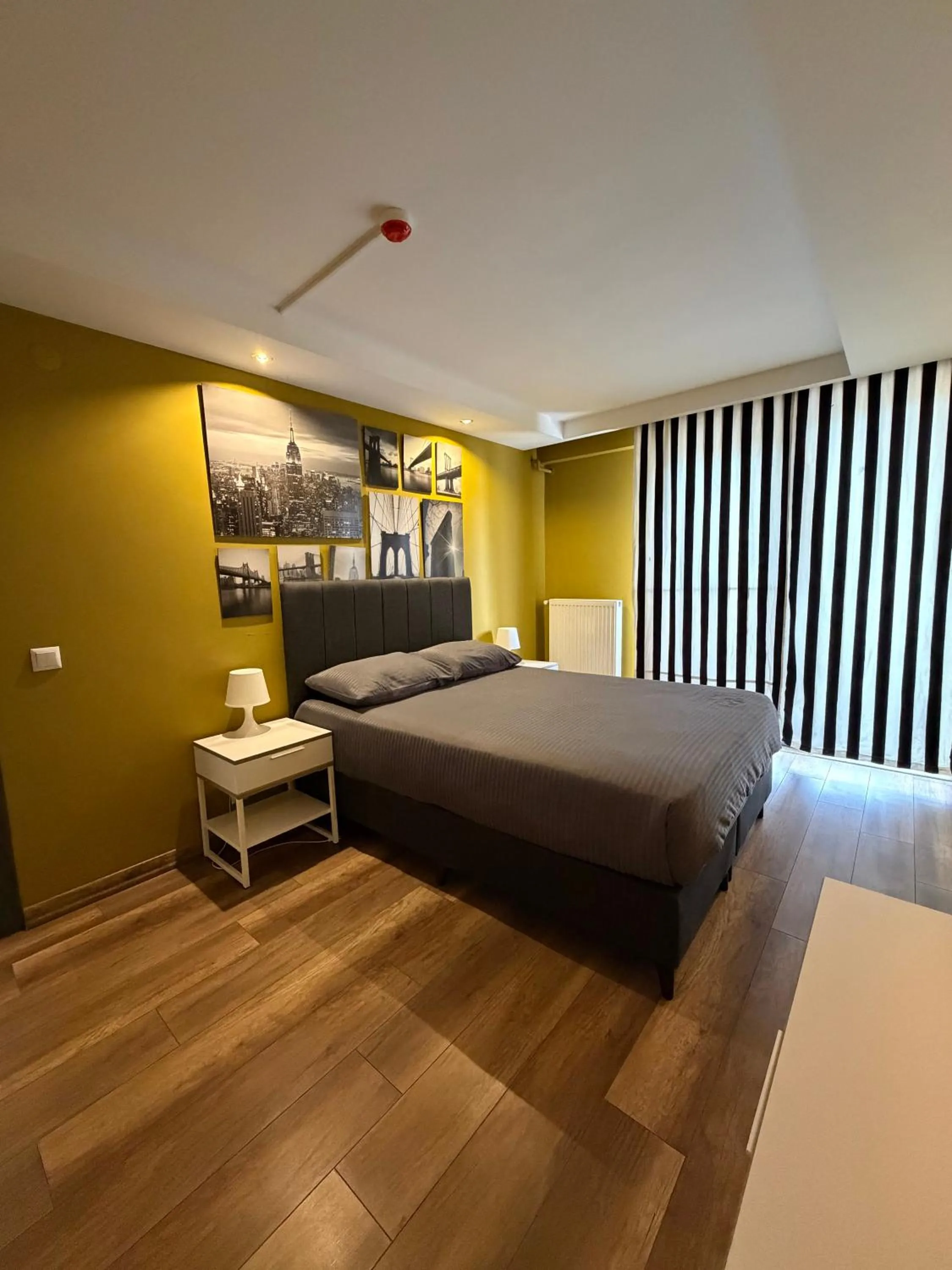 Bed in Deluxe Beach Residence