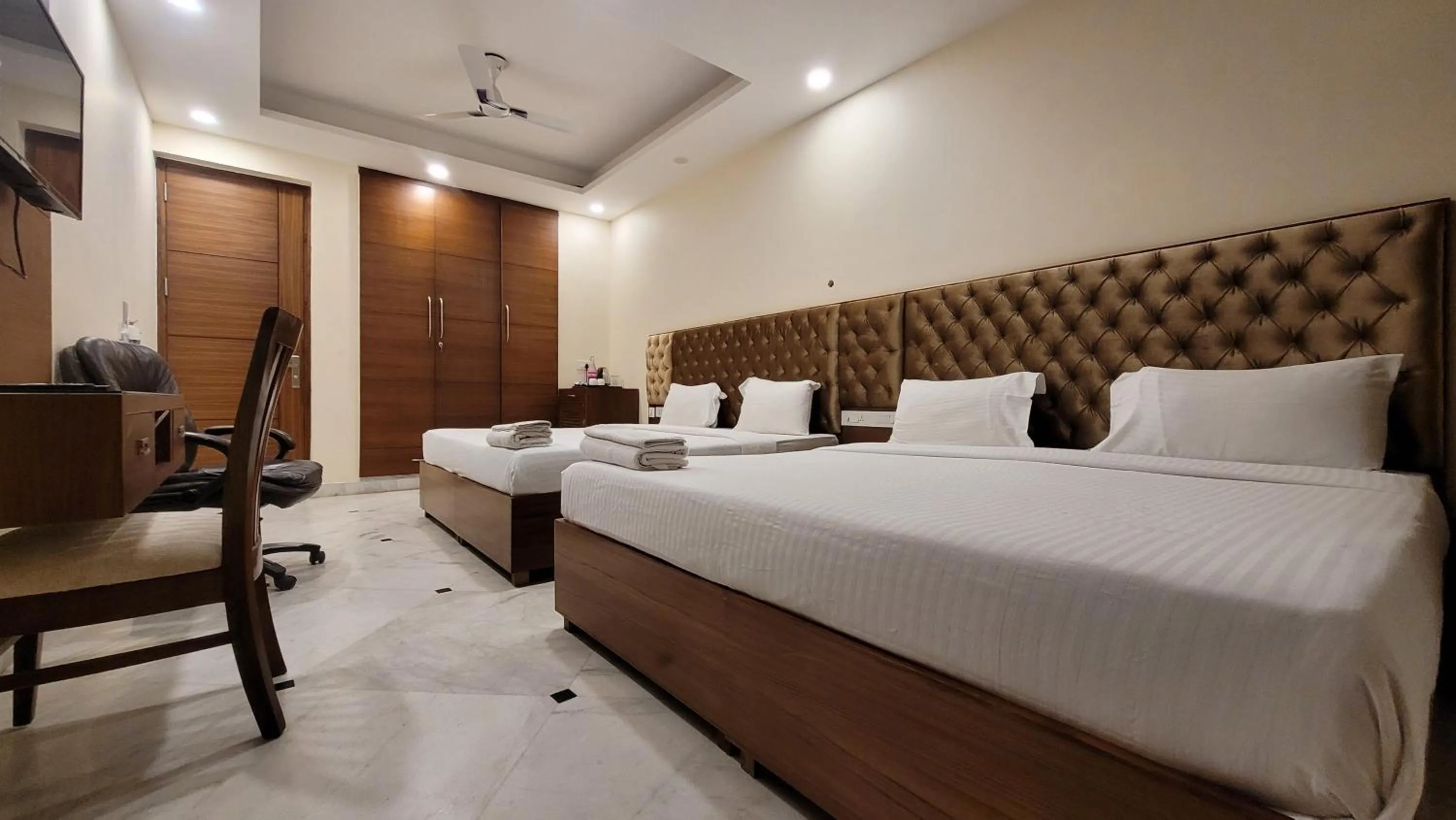 Bedroom, Bed in JMD Residency