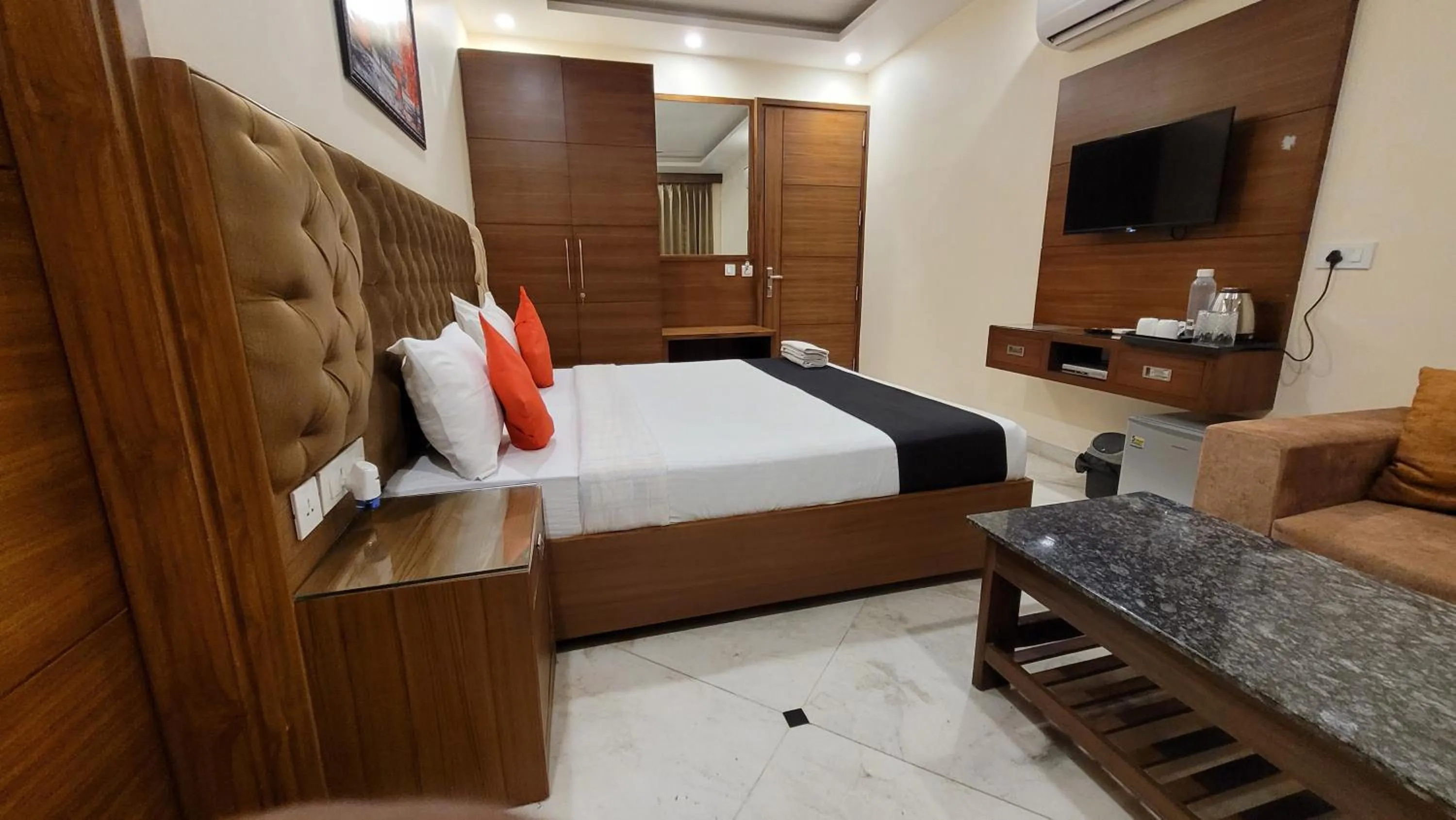 Bed in JMD Residency