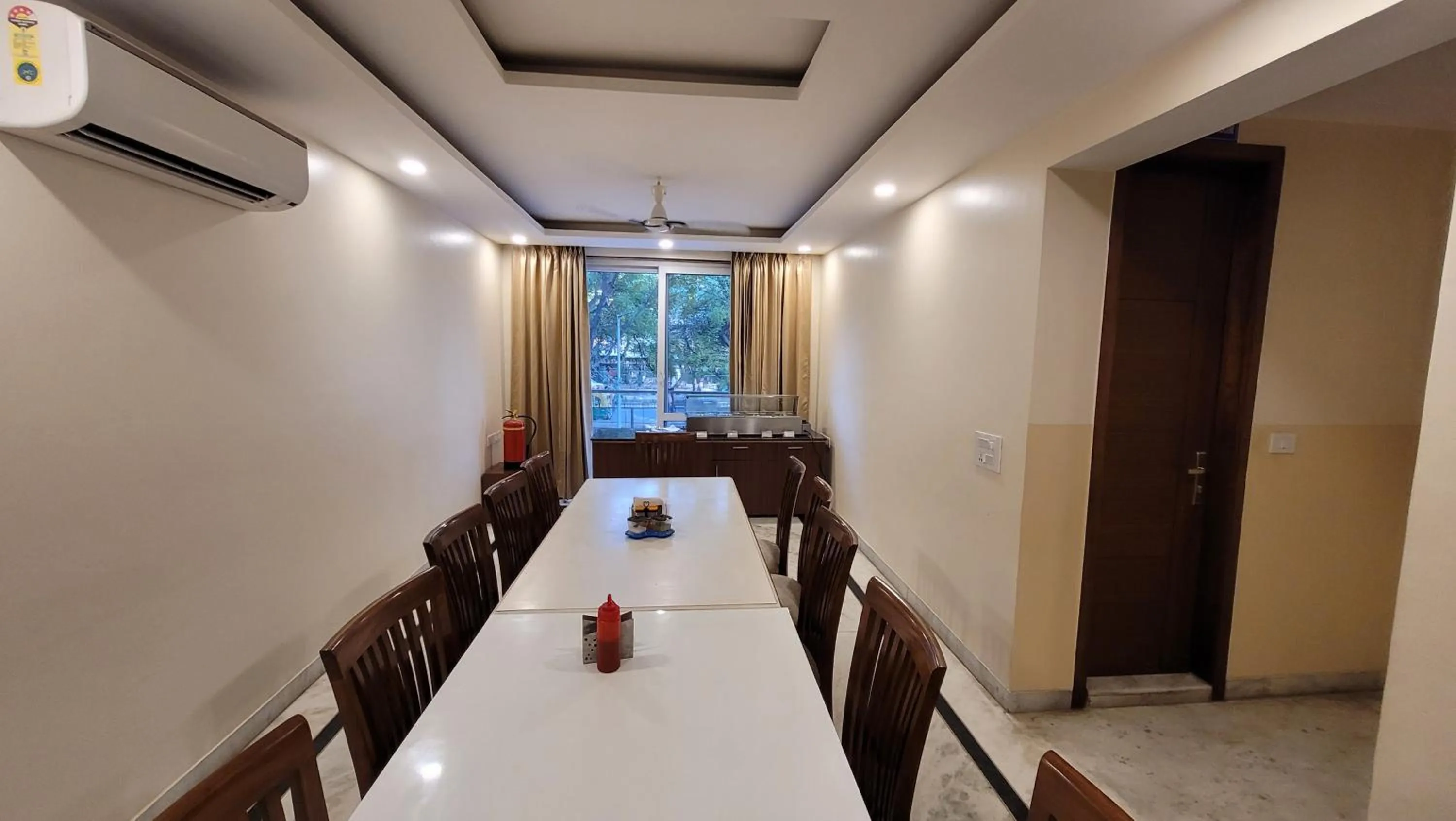 Dining area in JMD Residency