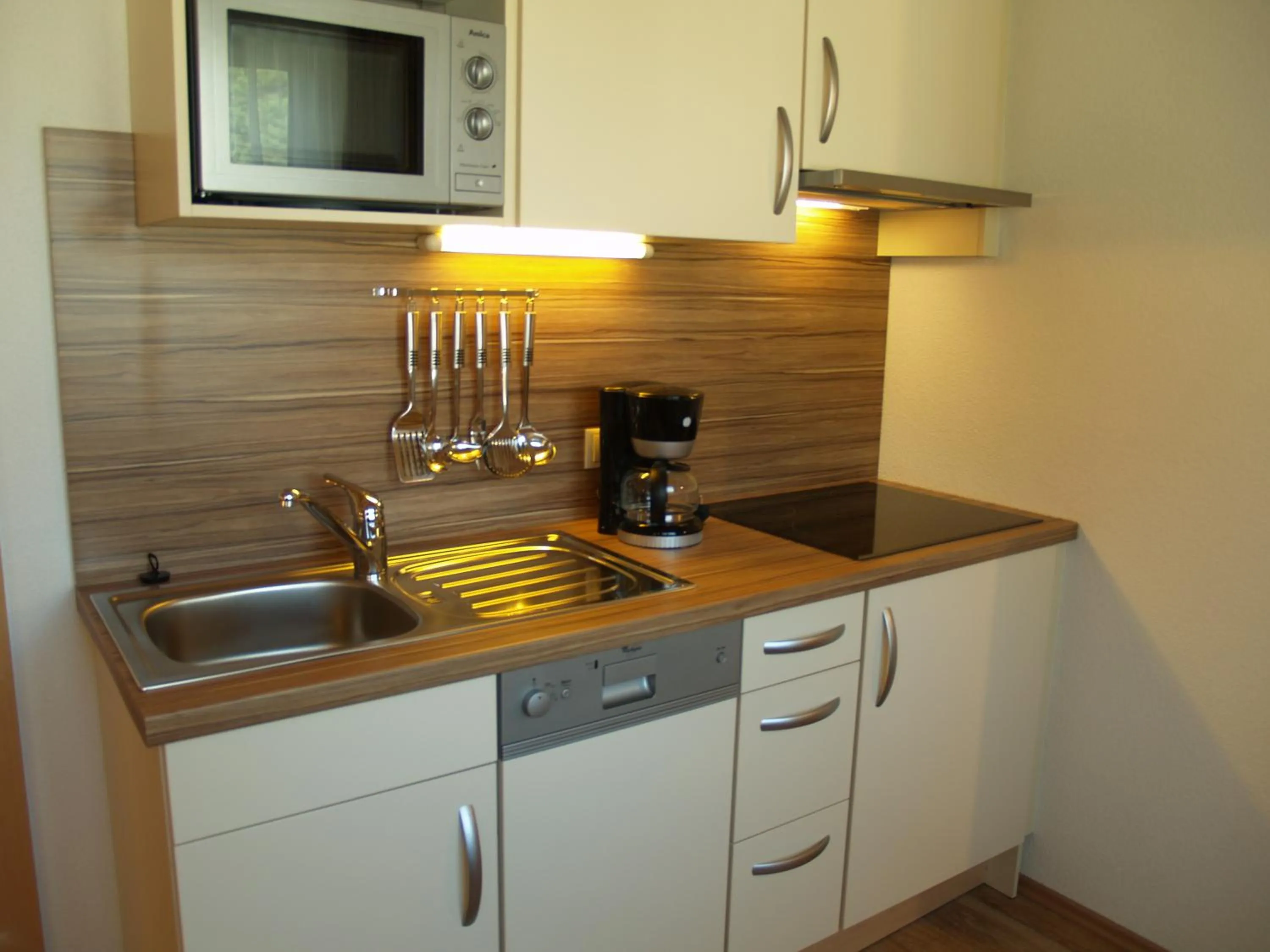 Kitchen or kitchenette in alpinea Appartements