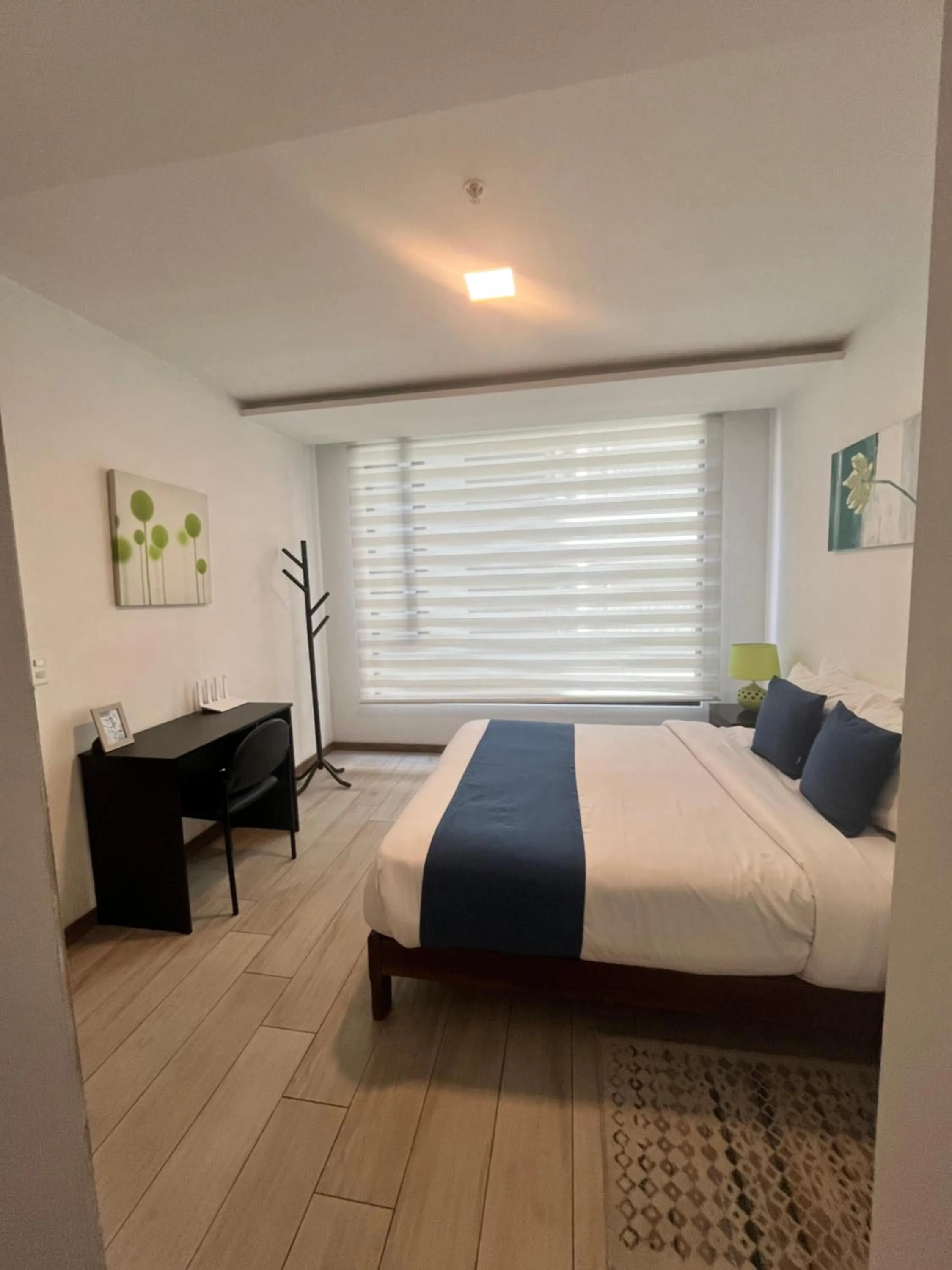 Bed in BlueZone Apartments