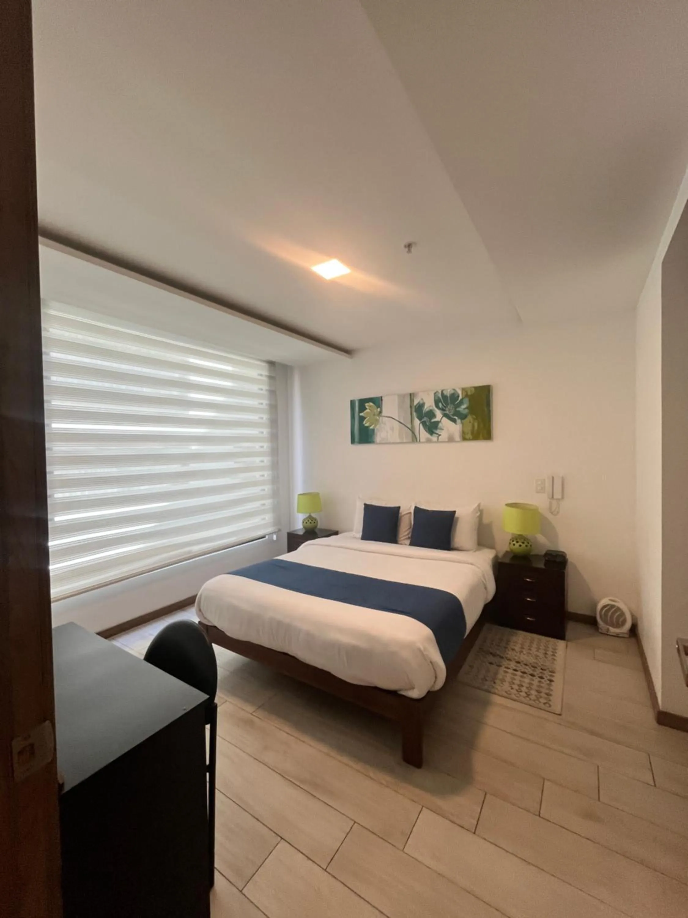 Bed in BlueZone Apartments