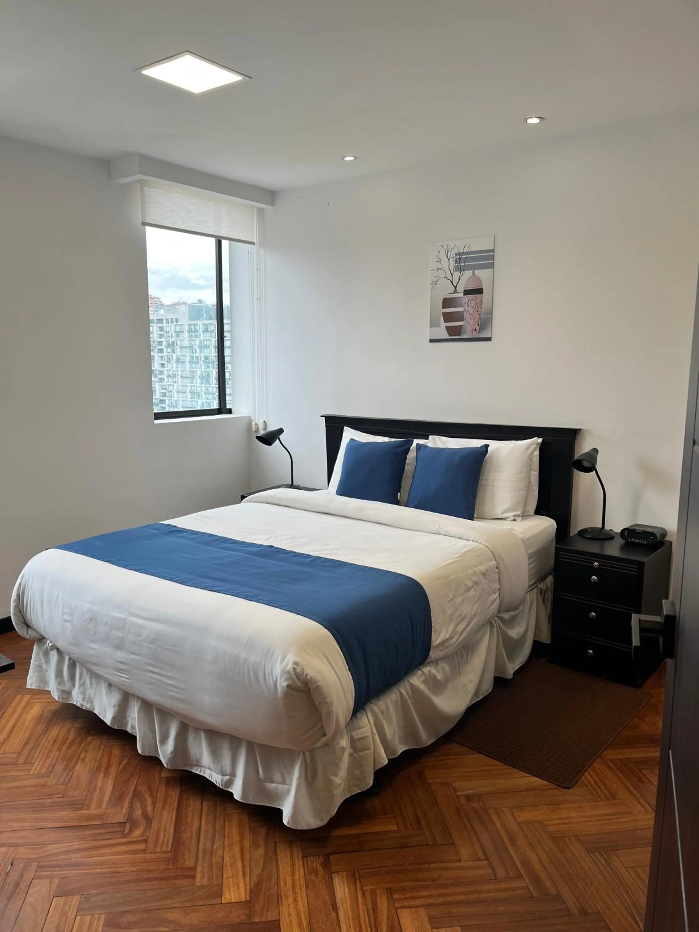 Bedroom, Bed in BlueZone Apartments