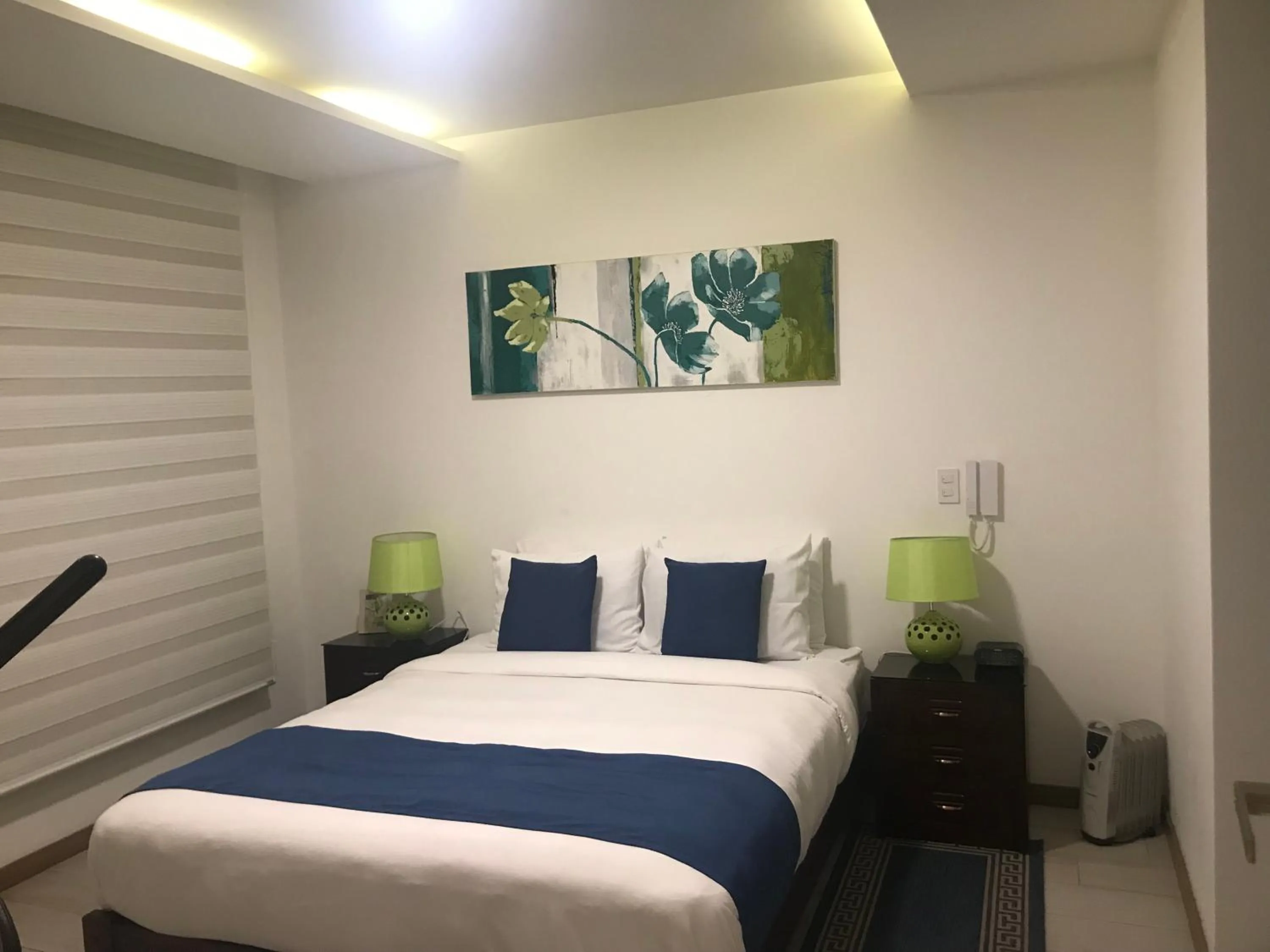 Bedroom, Bed in BlueZone Apartments