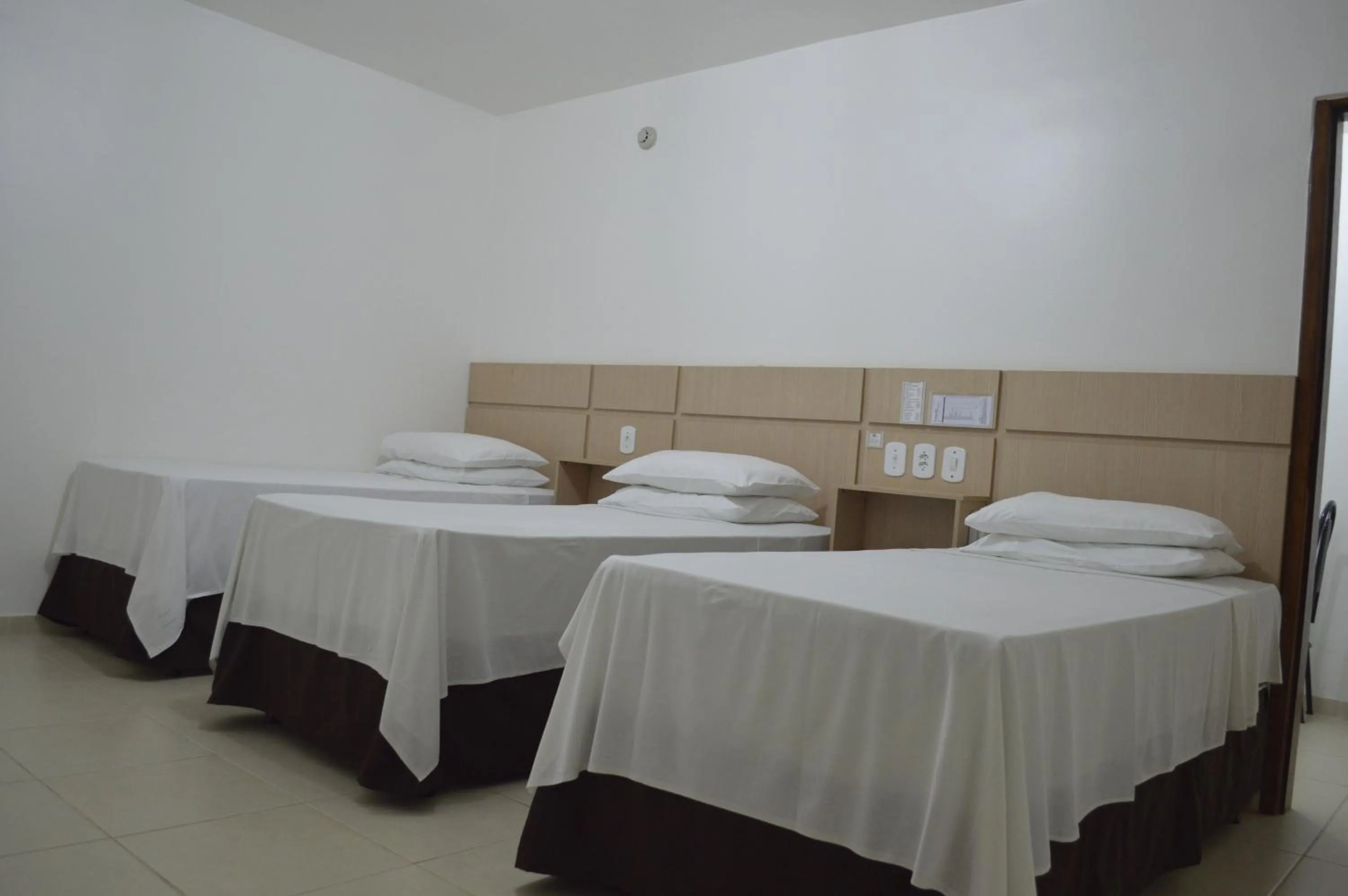 Bed in Richard Hotel