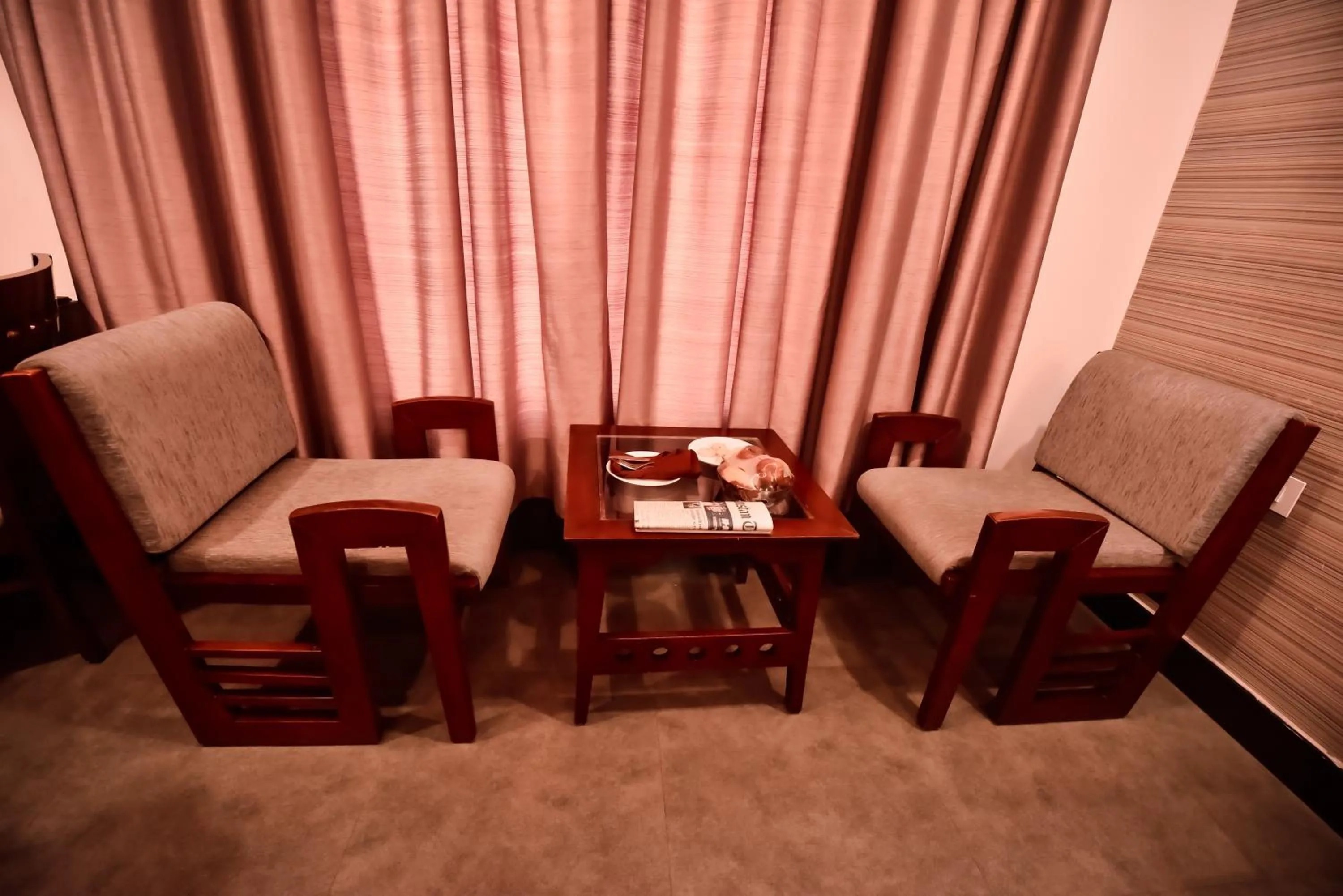 Seating area in Konark Grand Hotel