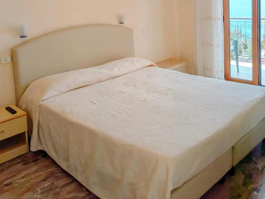 Bed in PARADISO Hotel Ristorante