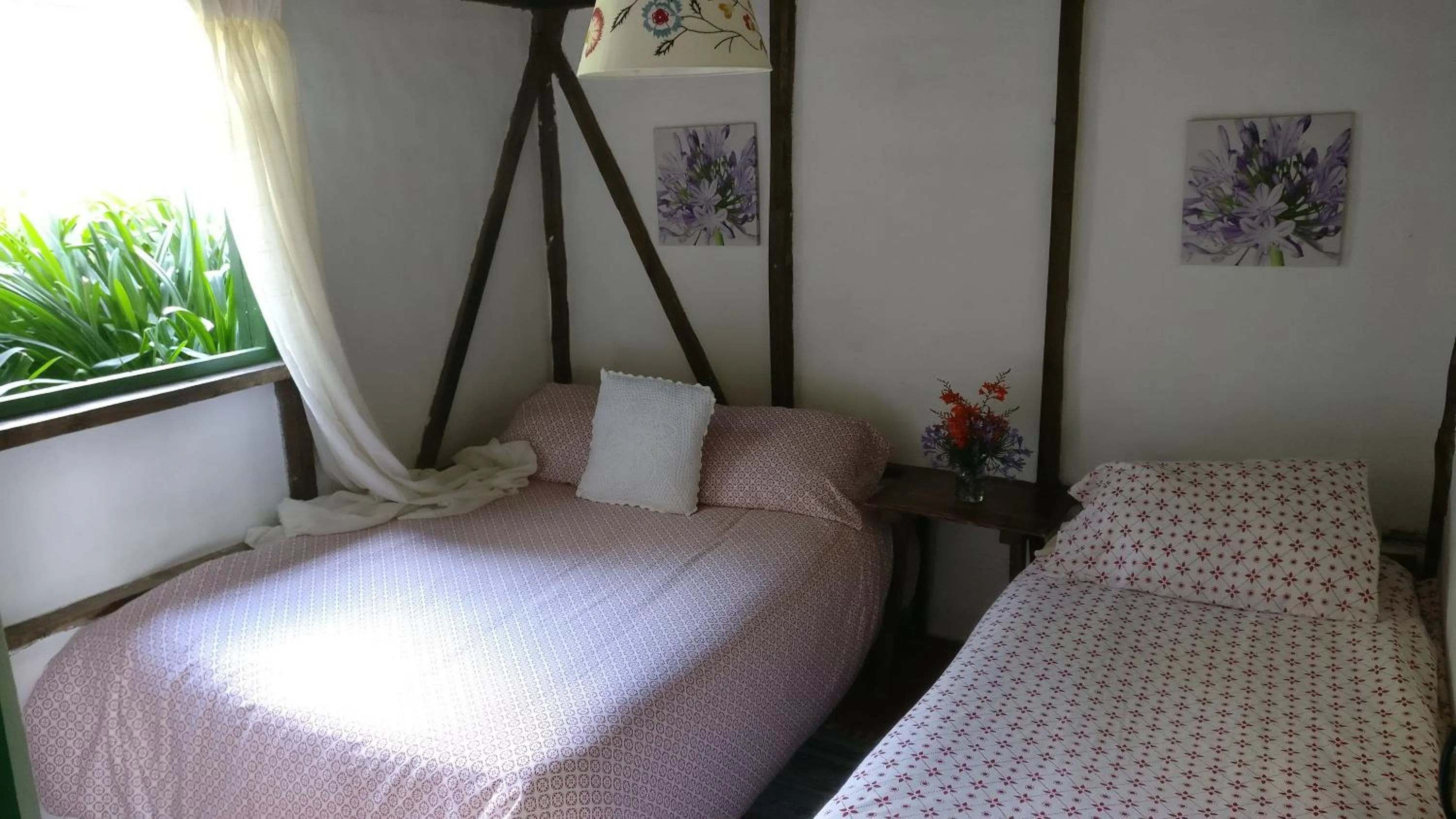 Bed in Villa Pajon Eco Lodge