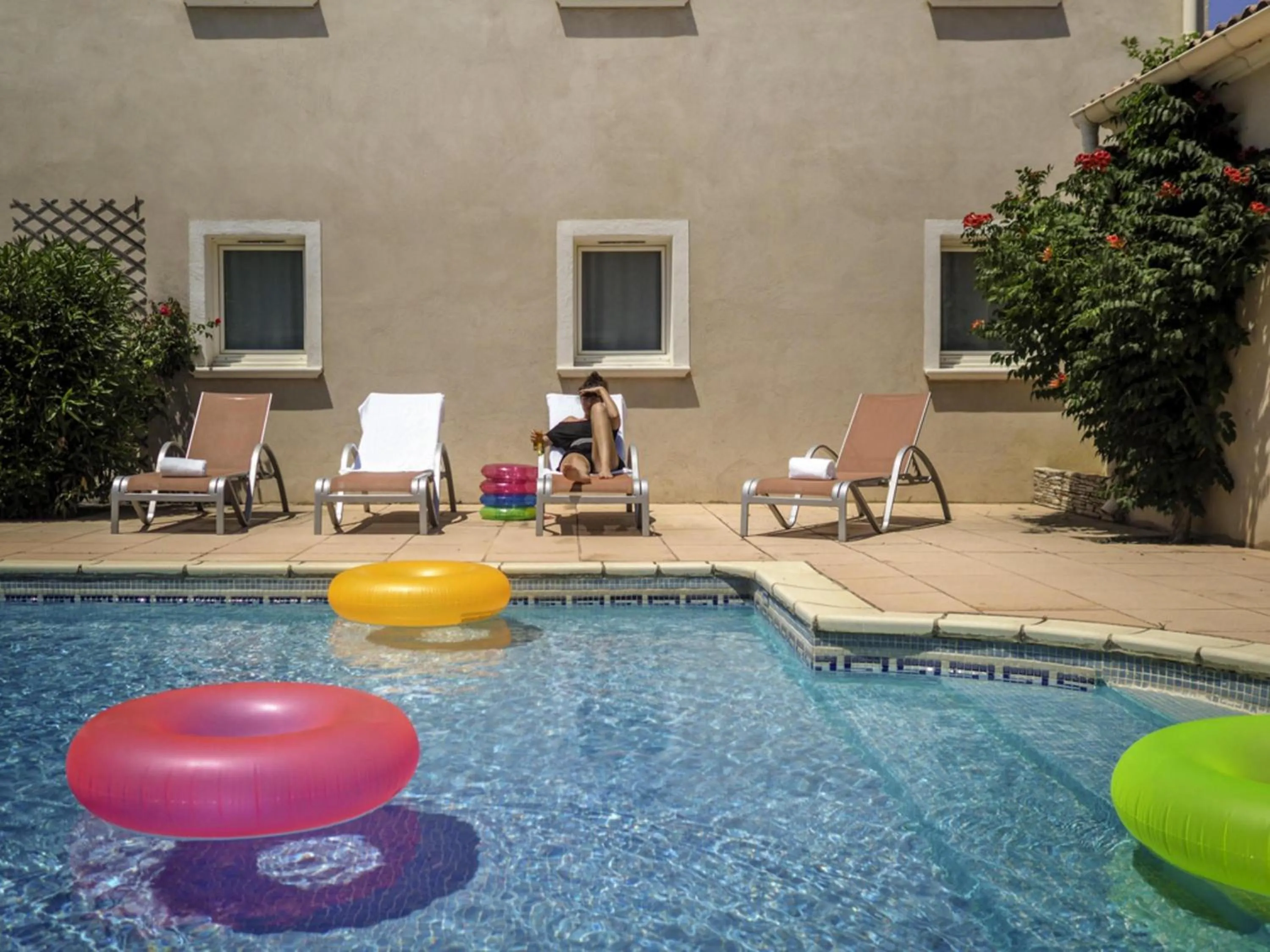 Pool view in ibis Orange Sud