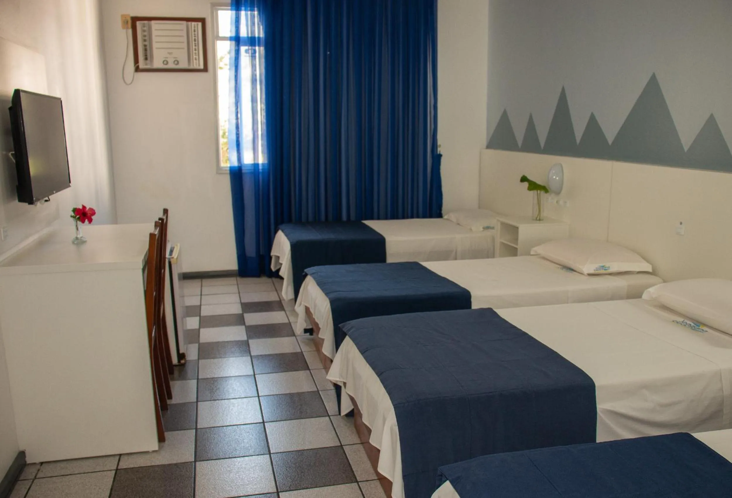 Photo of the whole room, Bed in Joaquina Beach Hotel