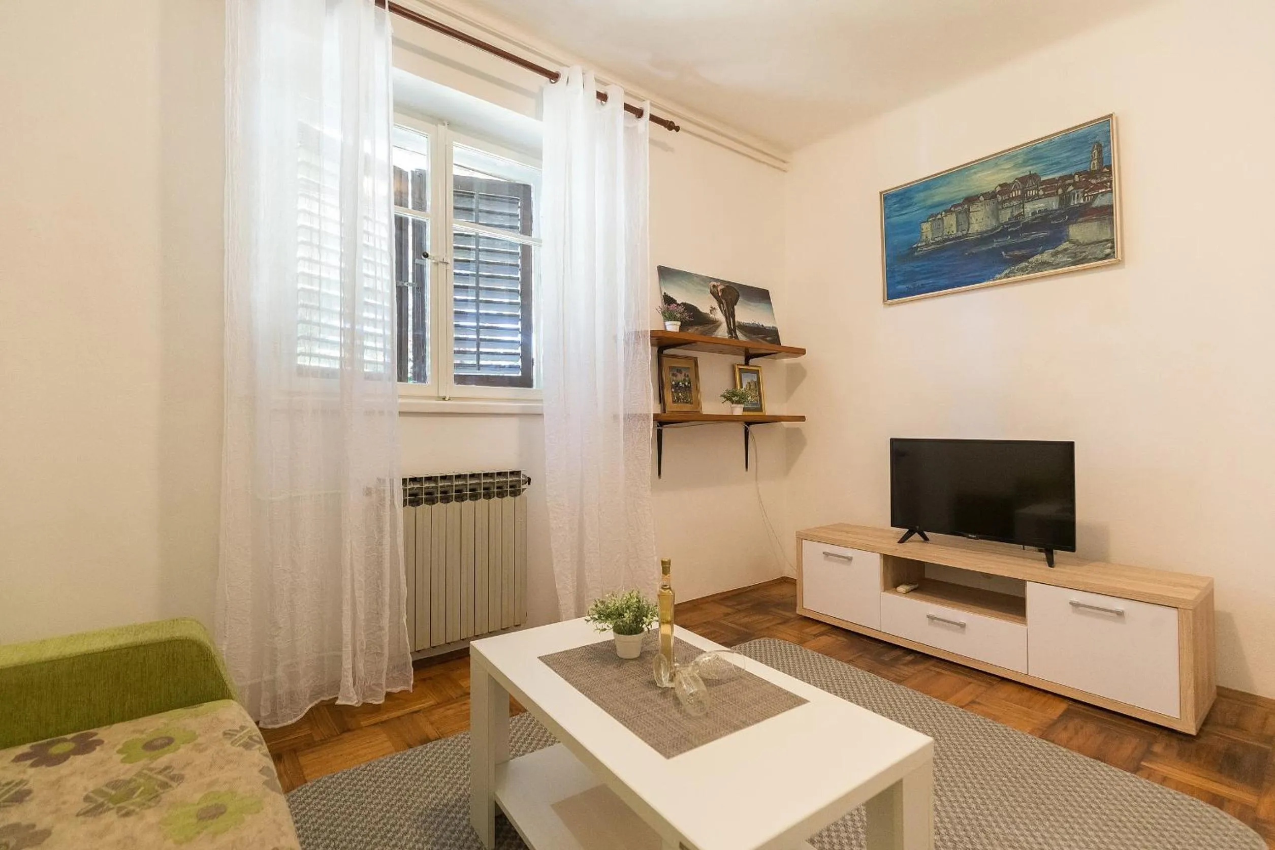 TV and multimedia in Apartment Tranquilo Garden