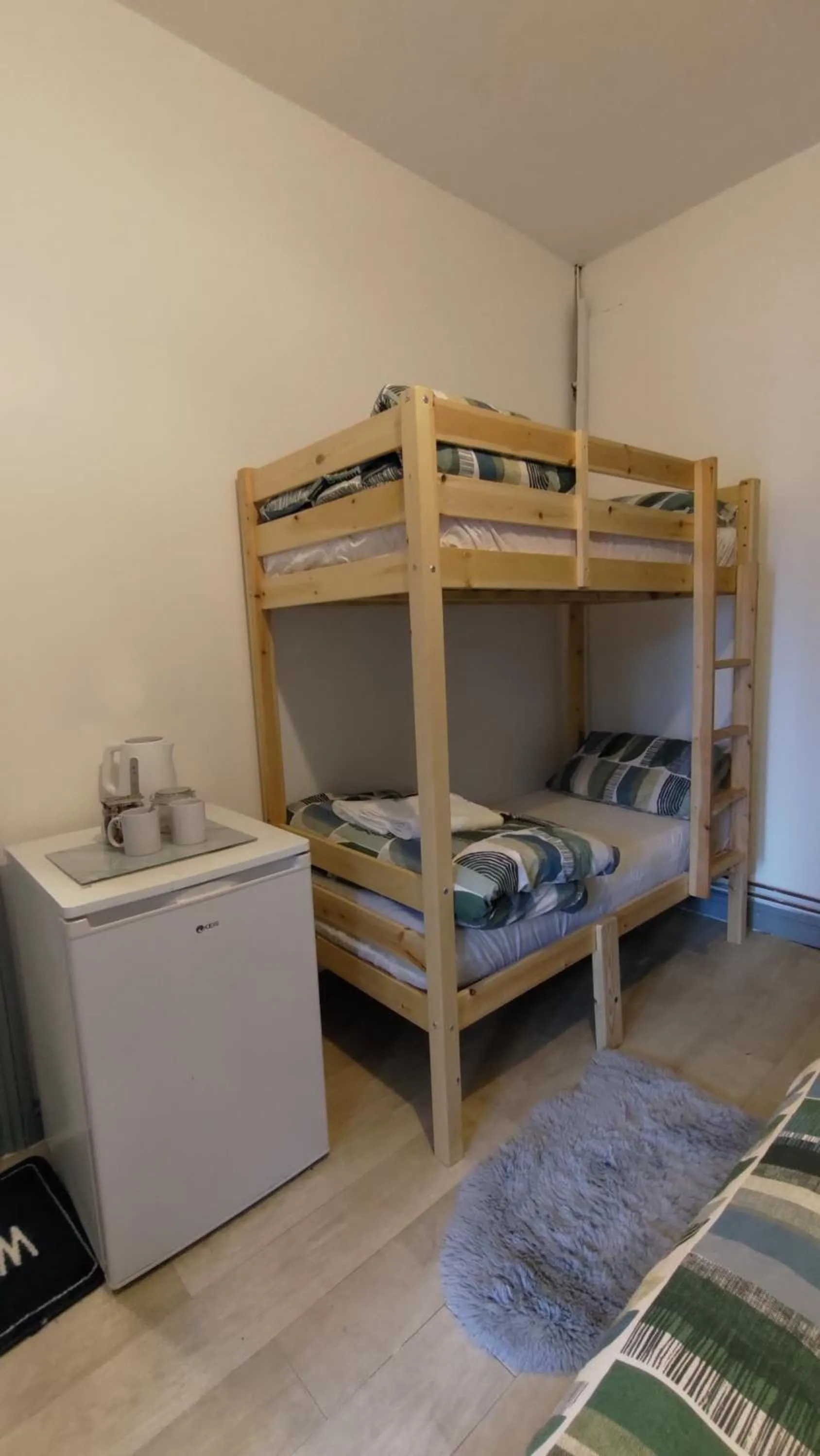 Bedroom, Bed in OYO Shore Surf Lodge