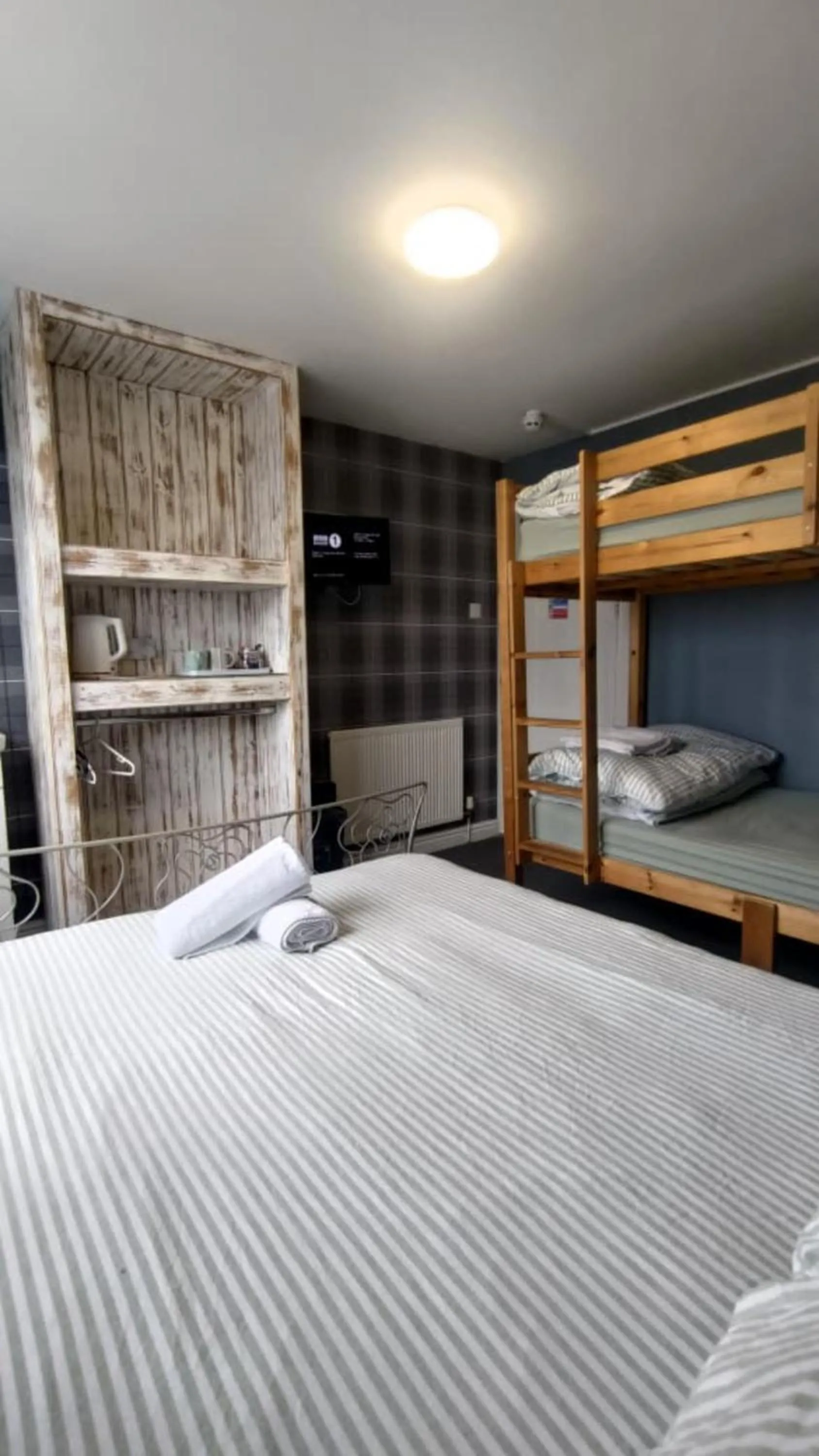 Bedroom, Bed in OYO Shore Surf Lodge