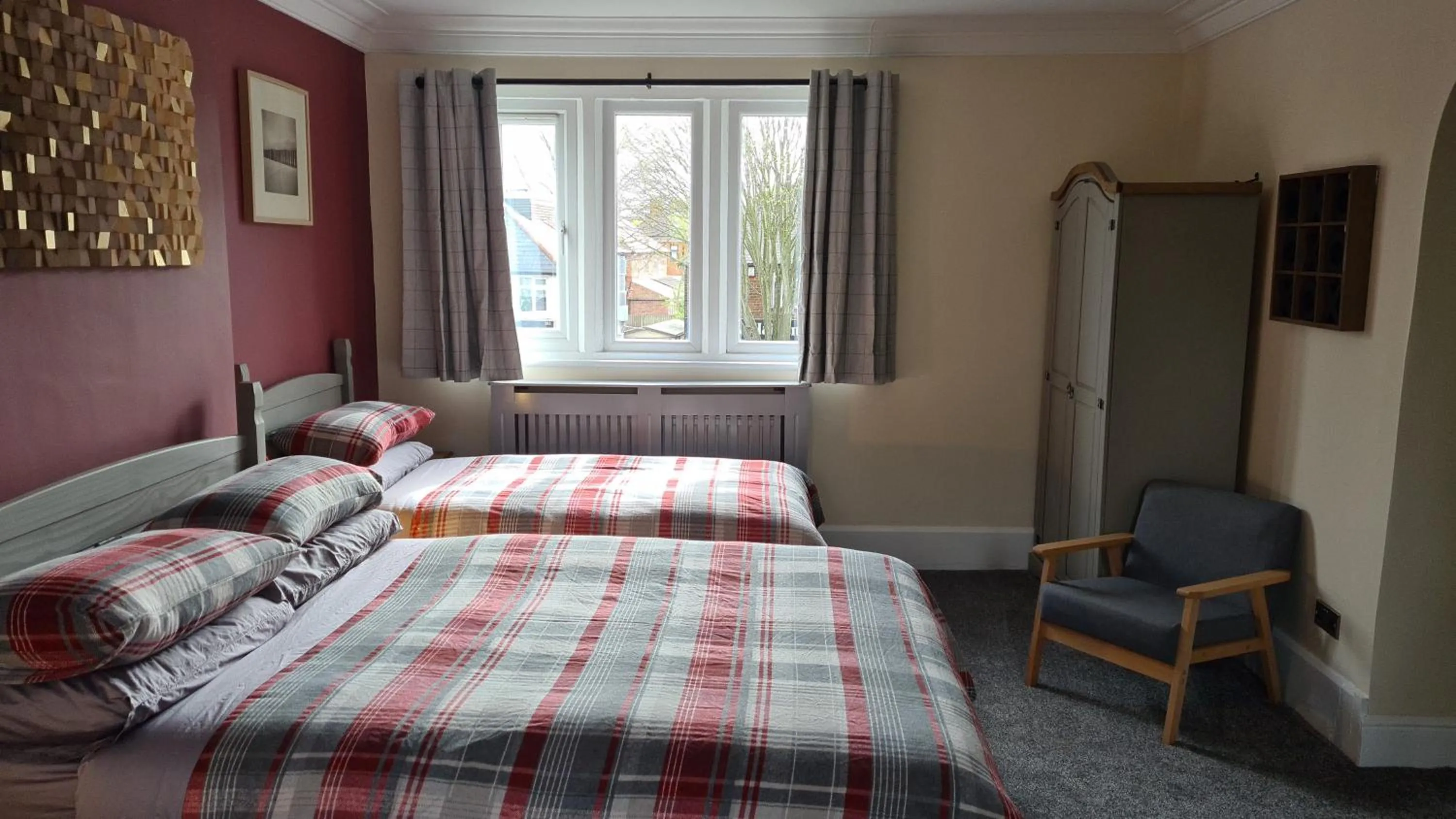 Bed in Tudor Lodge Hotel