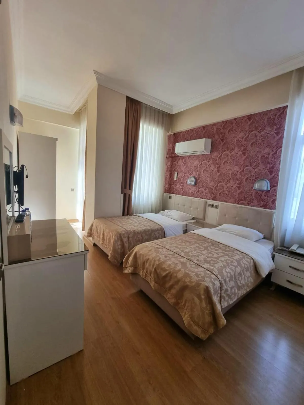 Bed in Perlo Hotel City