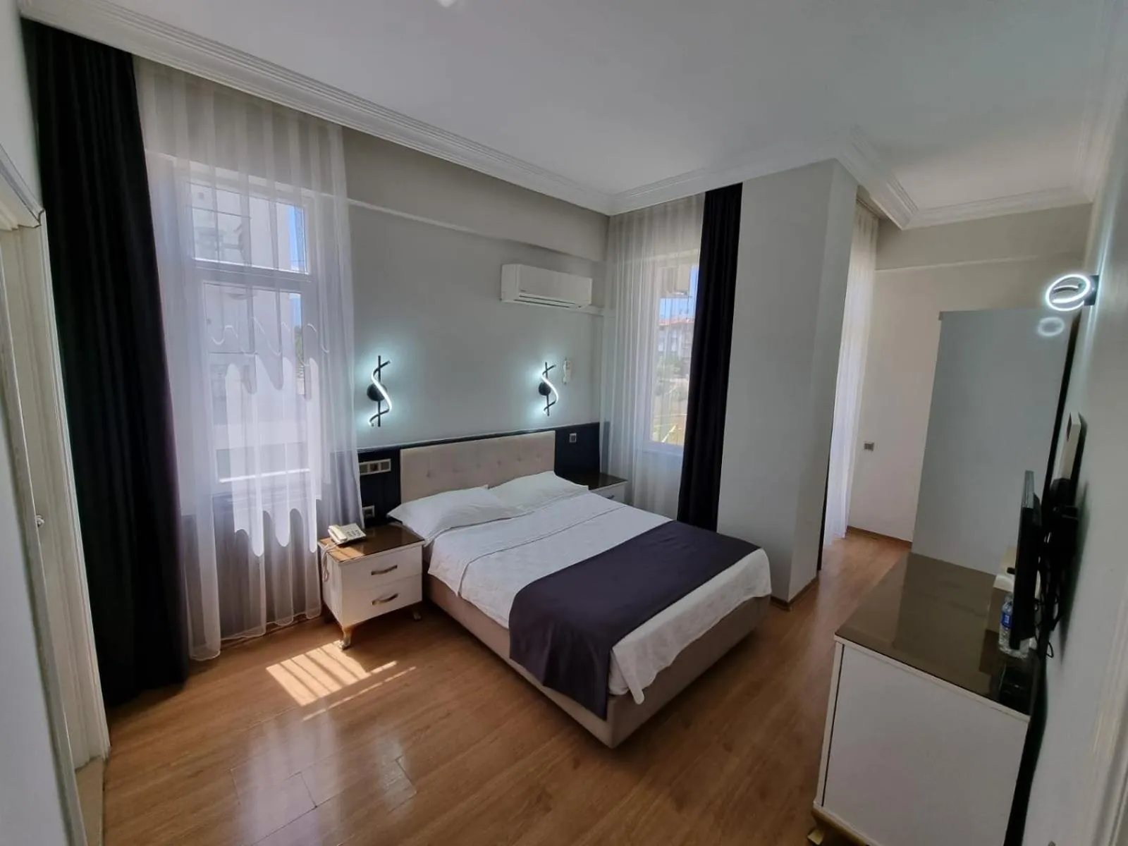 Photo of the whole room, Bed in Perlo Hotel City