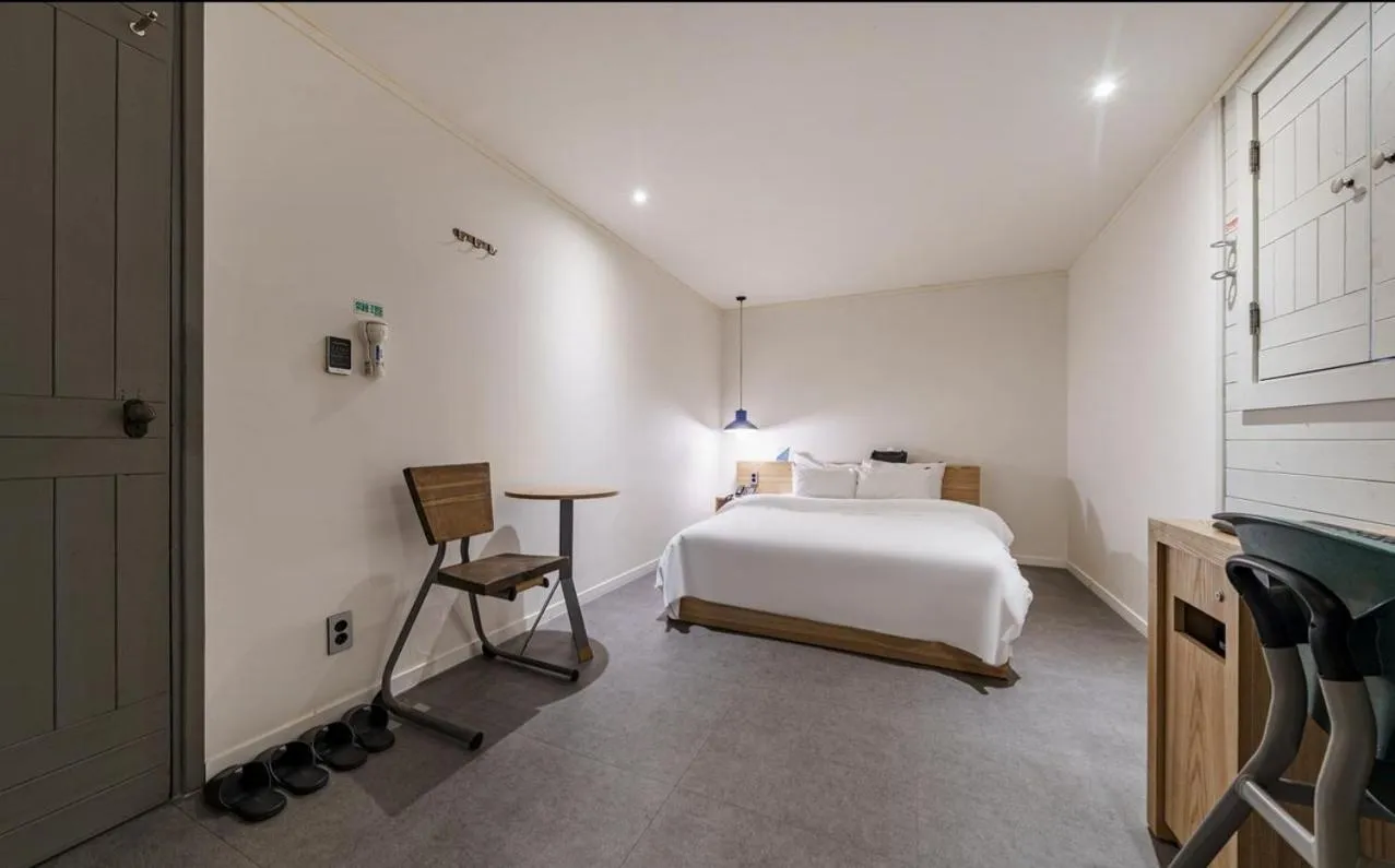 Bed in HOTEL YaJa WestGate