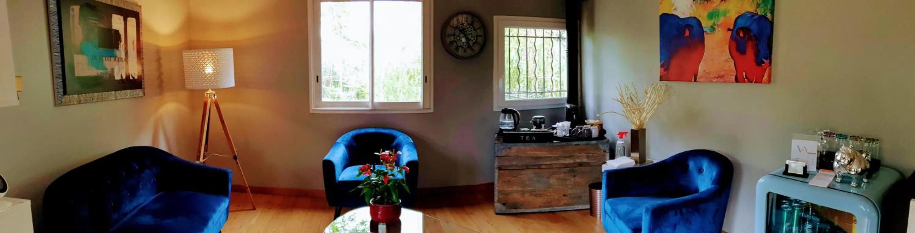 Communal lounge/ TV room in Villa Alyzea