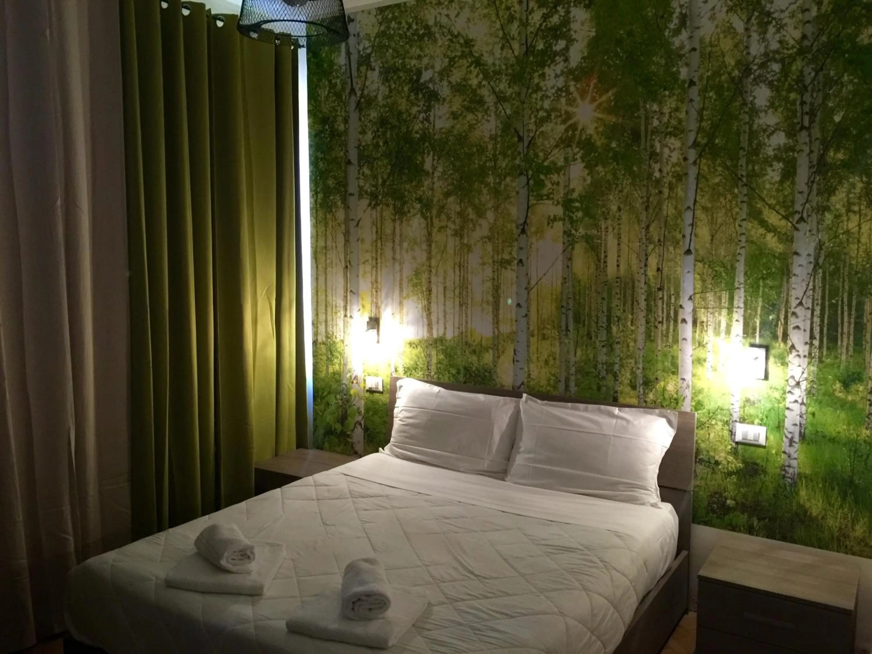 Bed in Rigoletto Rental Rooms