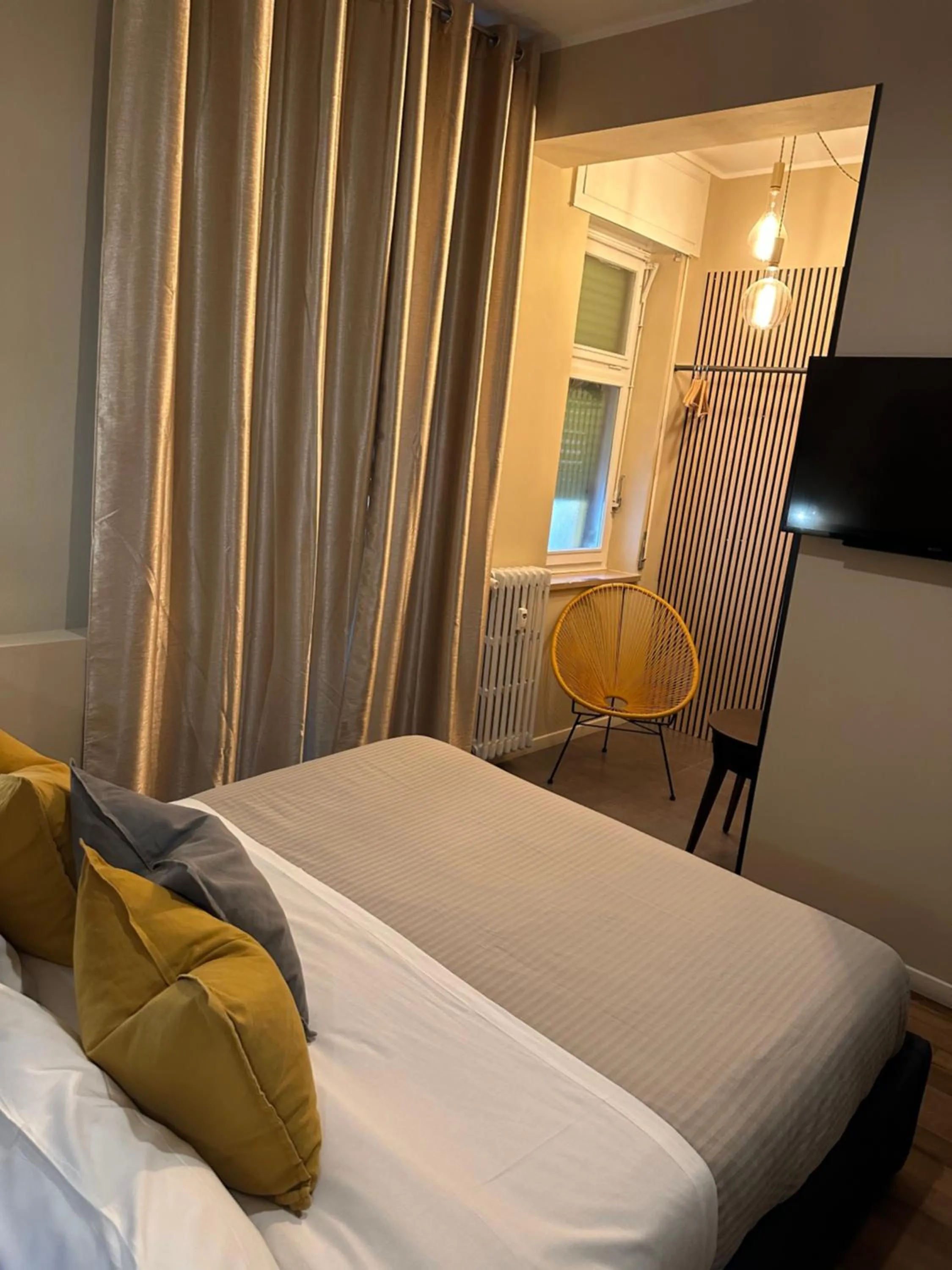 Bed in Rigoletto Rental Rooms